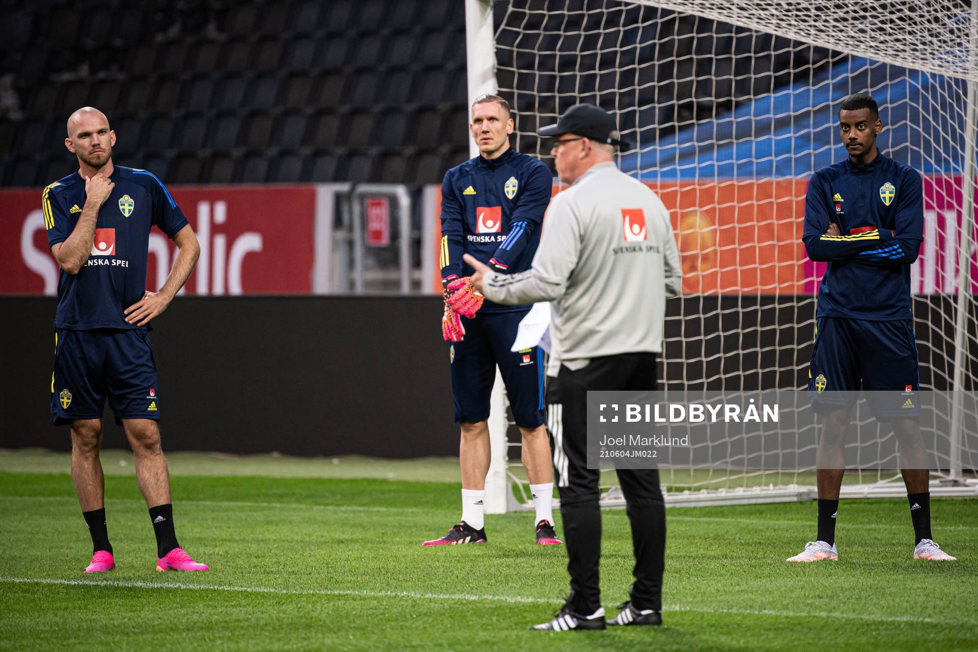 Marcus Danielson, Robin Olsen and Alexander Isak listen to