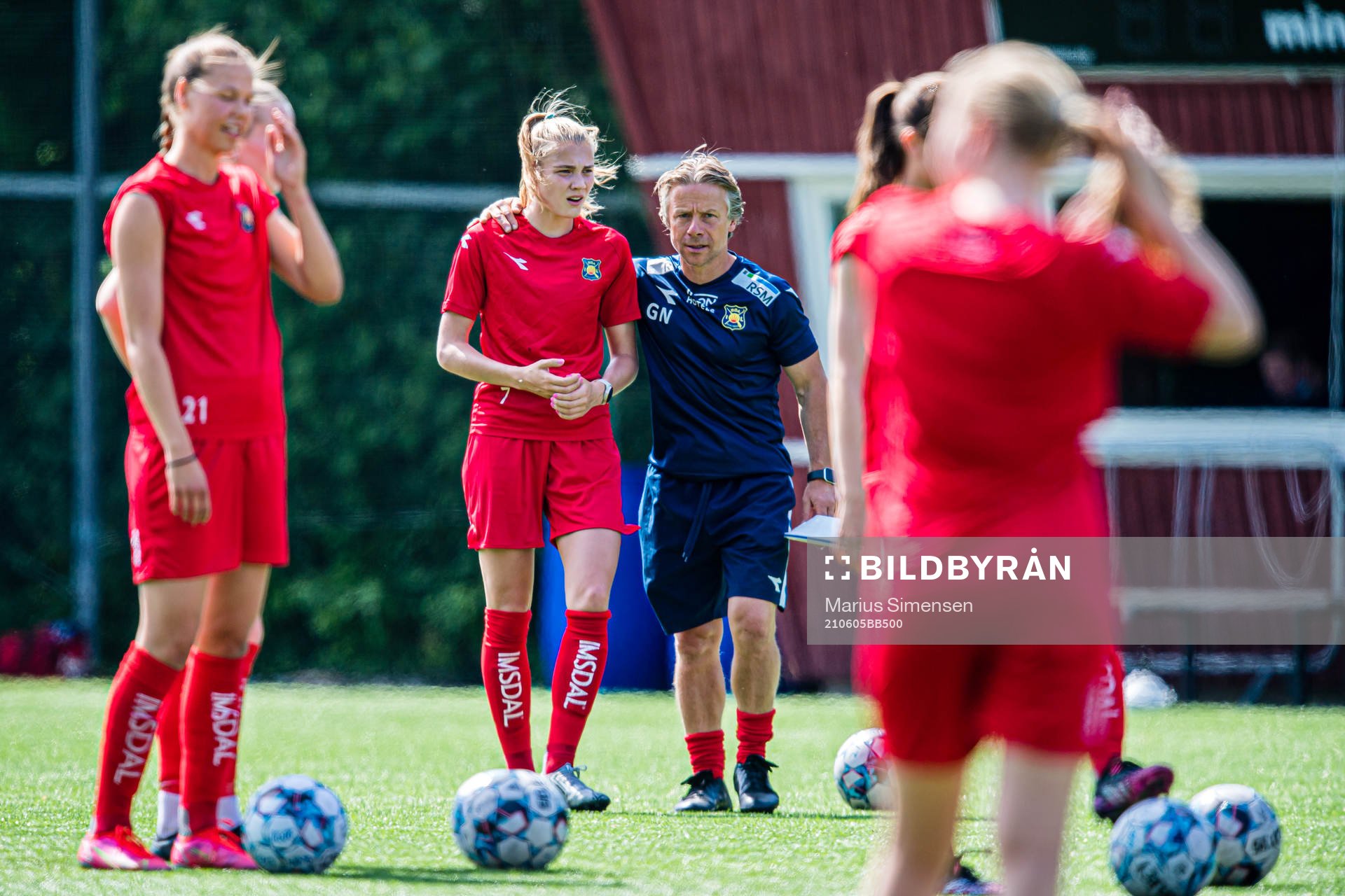 Oline Brekke Fuglem of Røa and Geir Nordby, head coach of