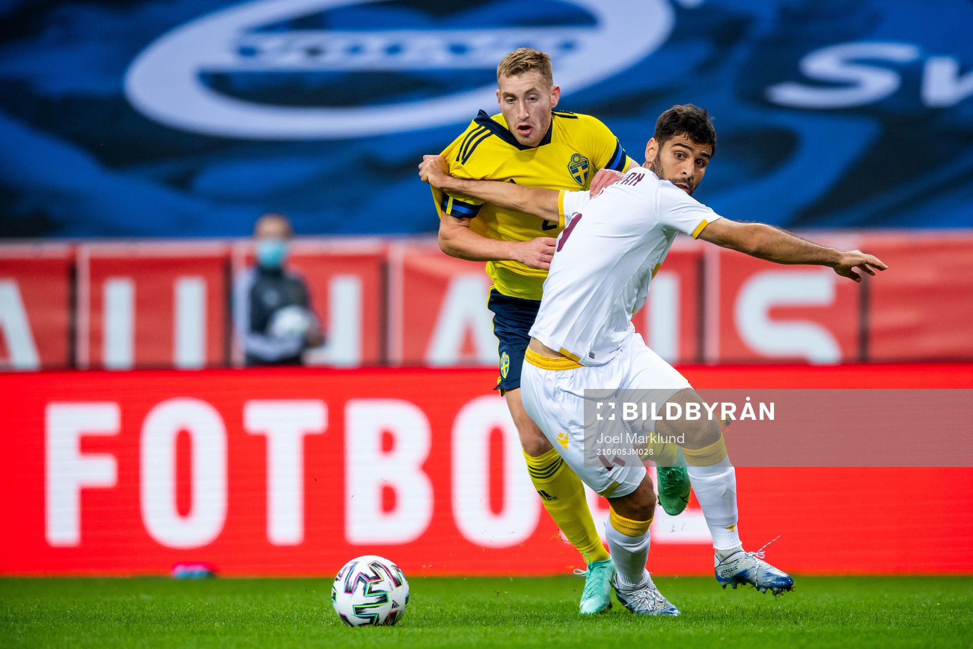 Dejan Kulusevski of Sweden and Taron Voskanyan of Armenia during the international friendly football match between Sweden and Armenia on June 5, 2021 in Stockholm.