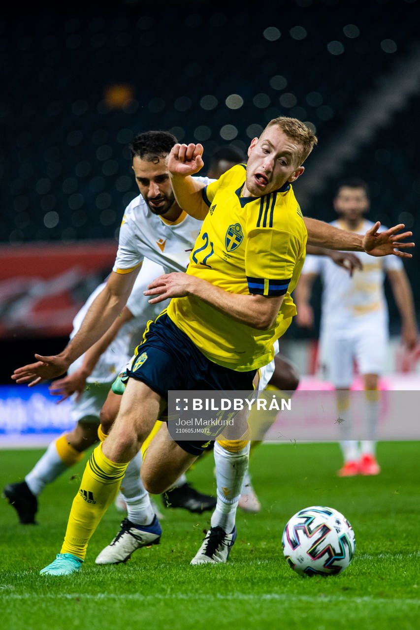 Andre Jack Calisir of Armenia and Dejan Kulusevski of Sweden