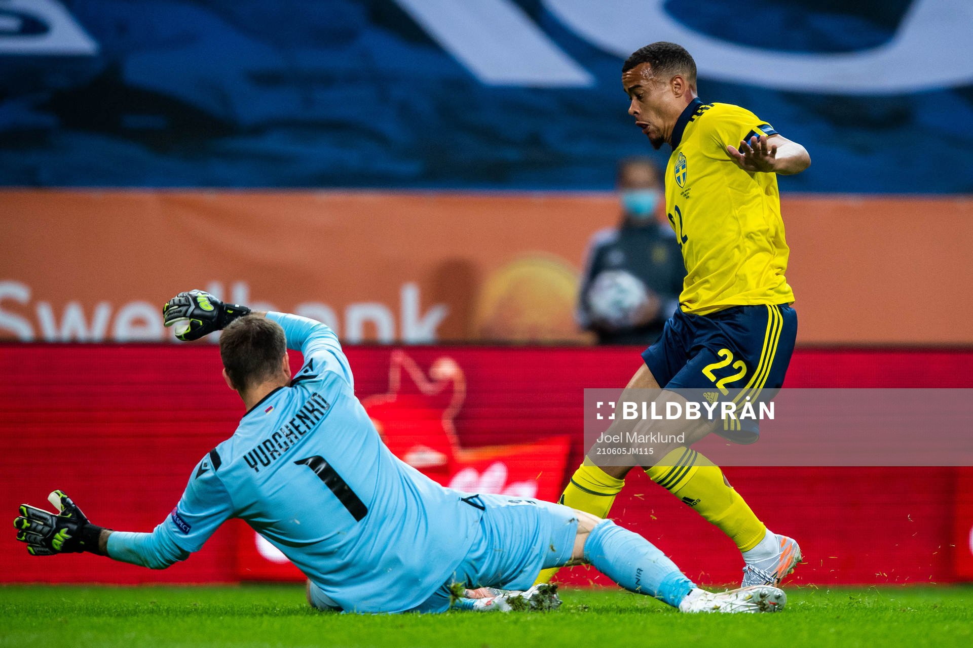 Goalkeeper Davit Yurchenko of Armenia and Robin Quaison