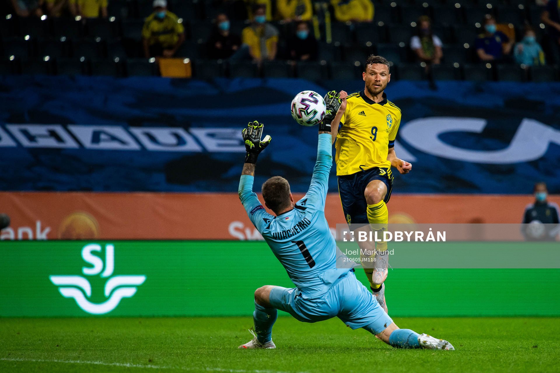 Goalkeeper Davit Yurchenko of Armenia and Marcus Berg of