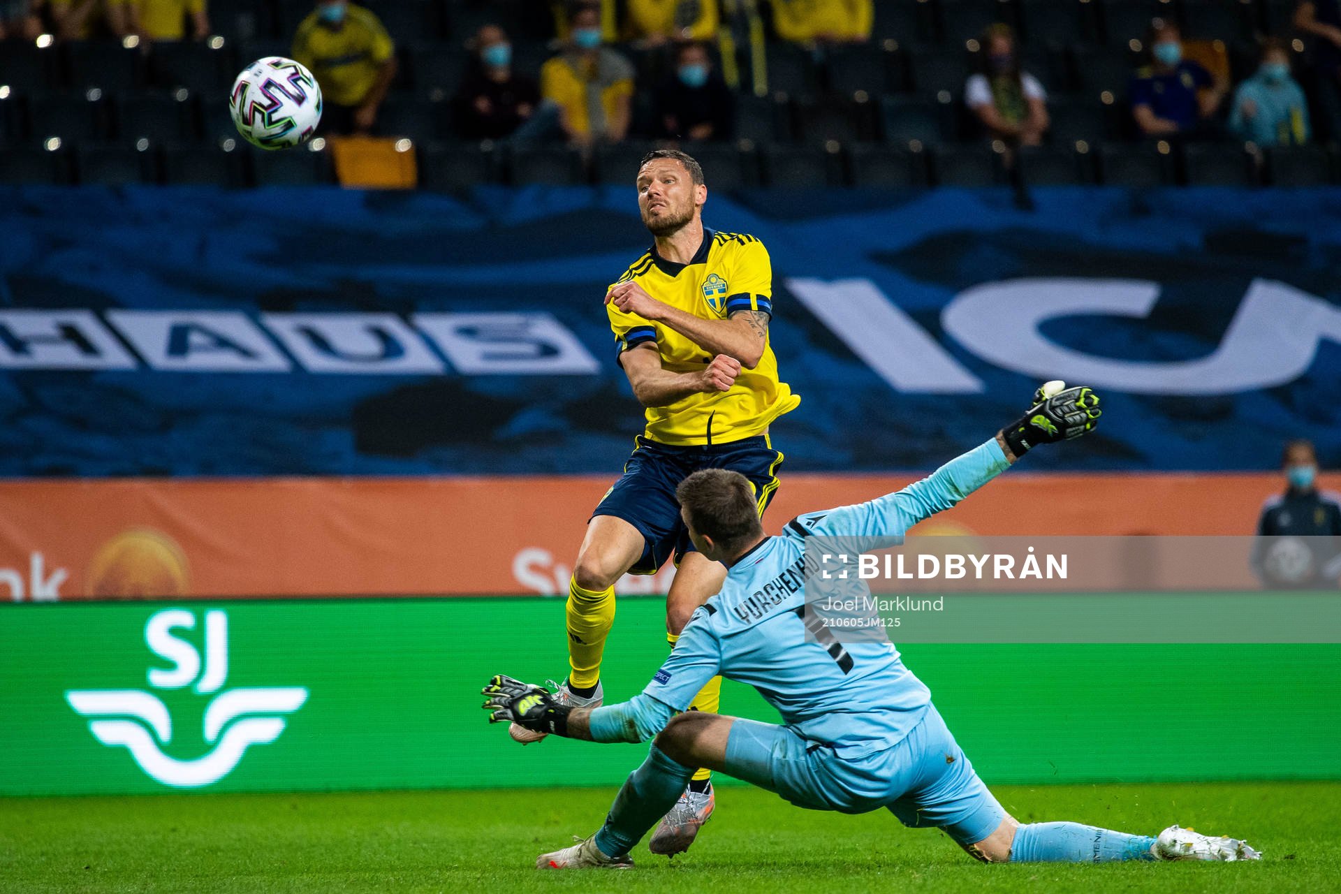 Marcus Berg of Sweden scores 3-1 behind goalkeeper Davit