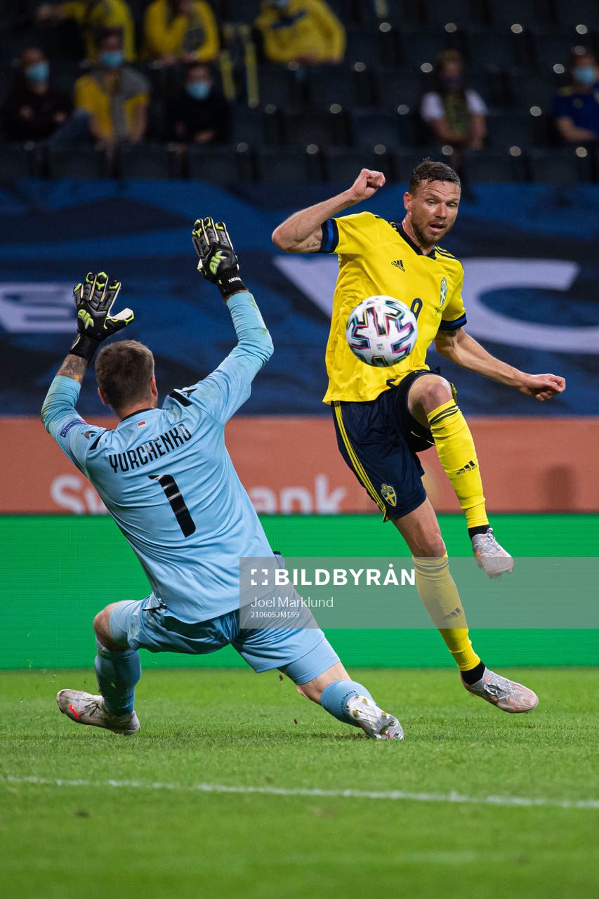 Marcus Berg of Sweden scores 3-1 behind goalkeeper Davit