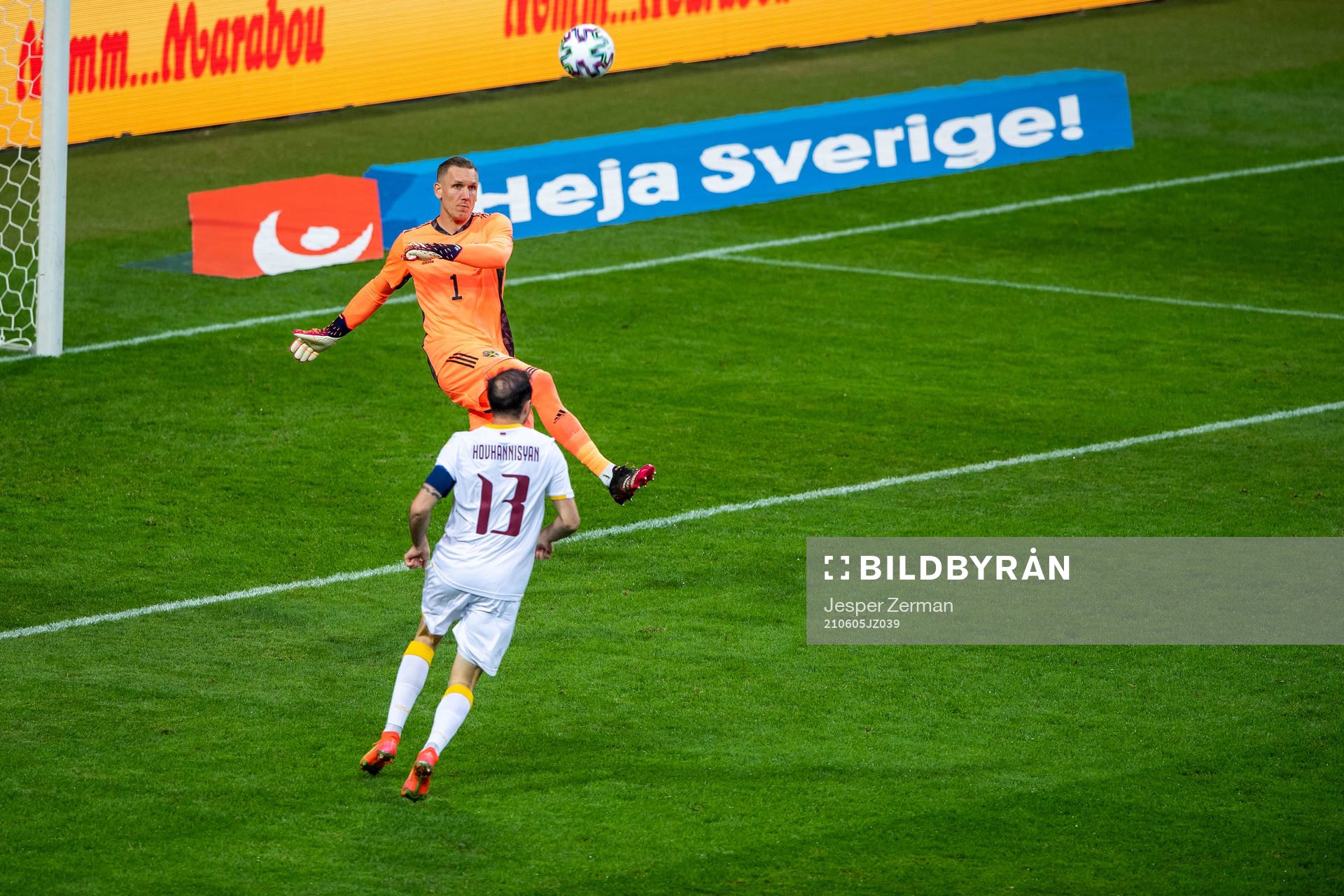 Goalkeeper Robin Olsen of Sweden and Kamo Hovhannisyan of