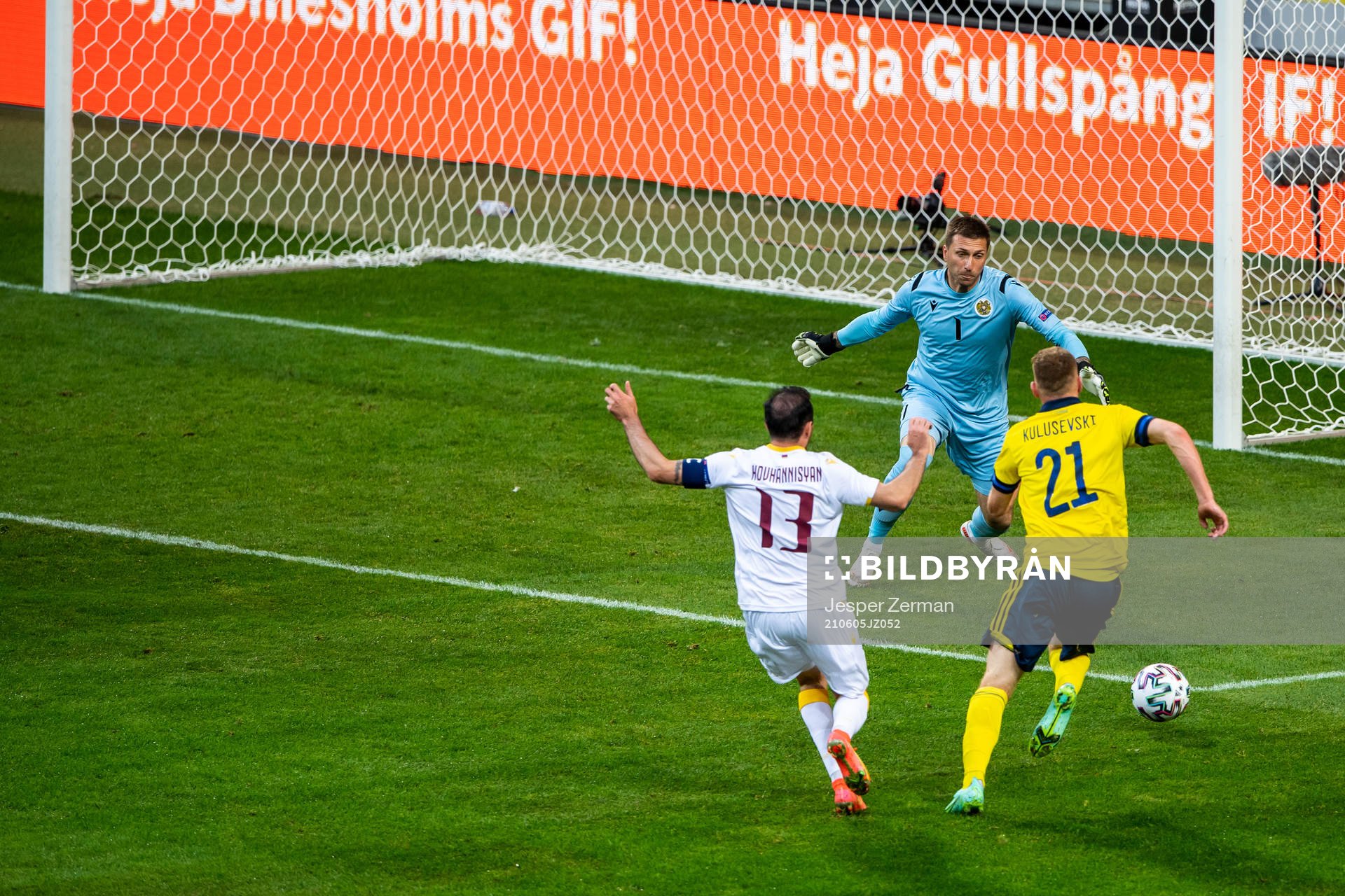 Goalkeeper Davit Yurchenko and Kamo Hovhannisyan of Armenia