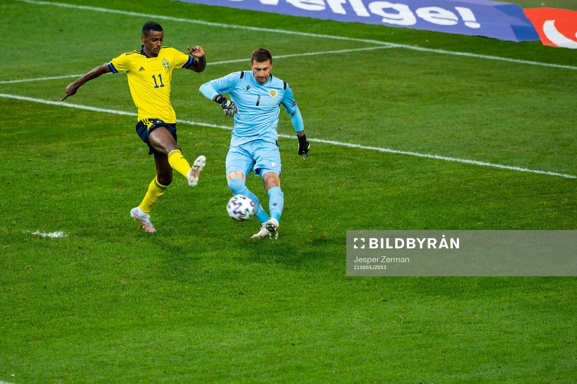 Alexander Isak of Sweden and goalkeeper Davit Yurchenko of