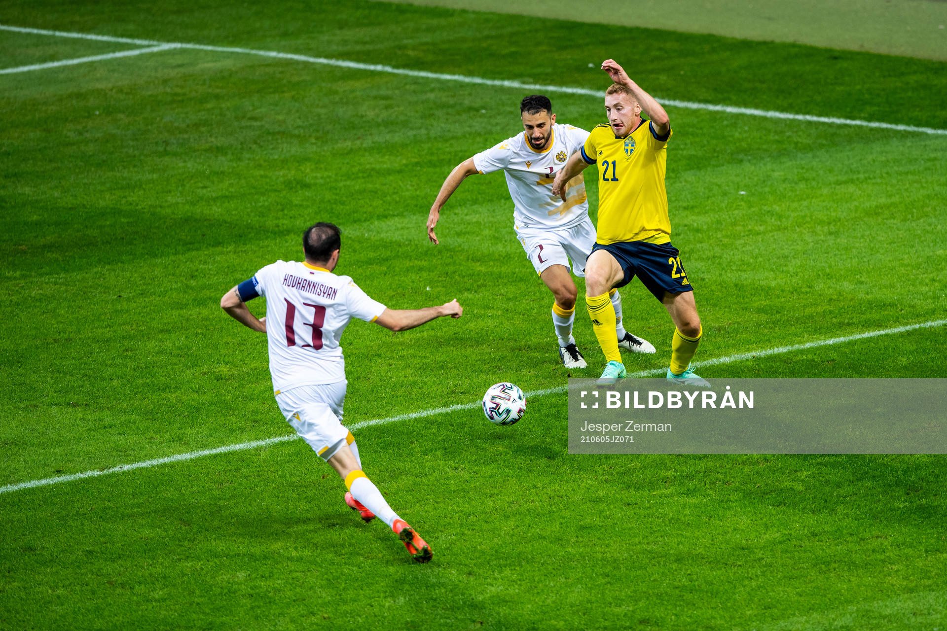 Andre Jack Calisir of Armenia and Dejan Kulusevski of Sweden