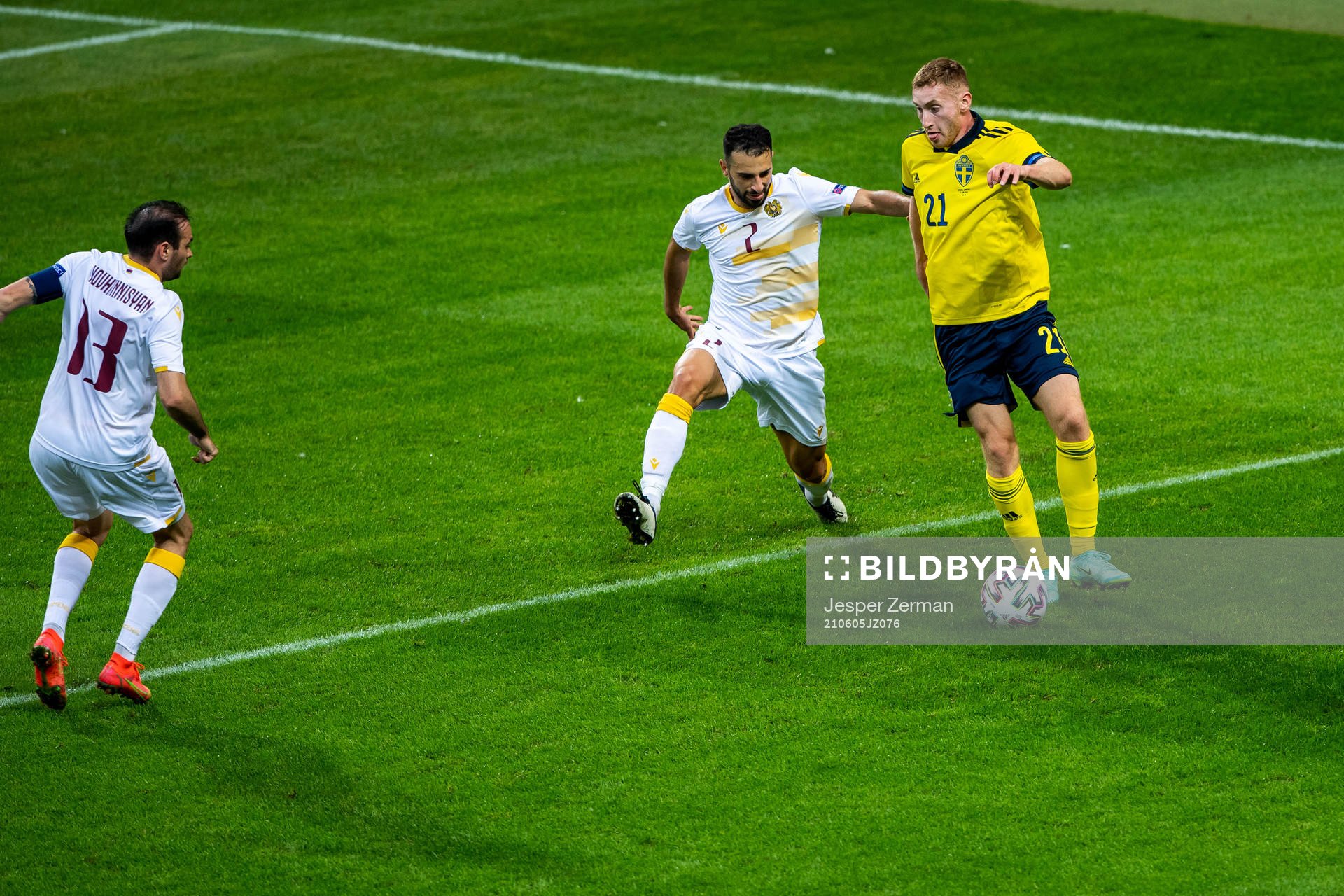 Andre Jack Calisir of Armenia and Dejan Kulusevski of Sweden