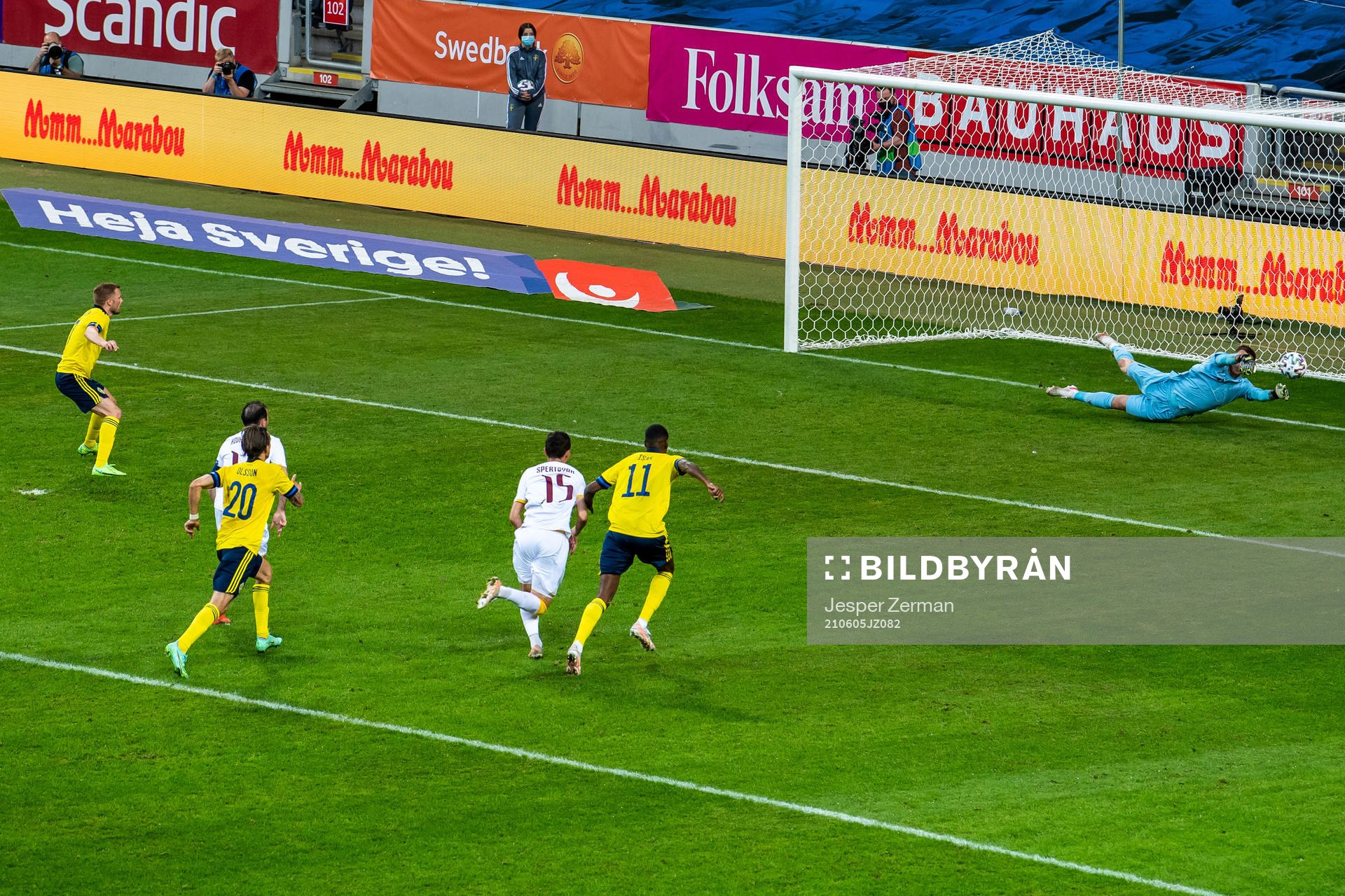 Goalkeeper Davit Yurchenko of Armenia saves a penalty from