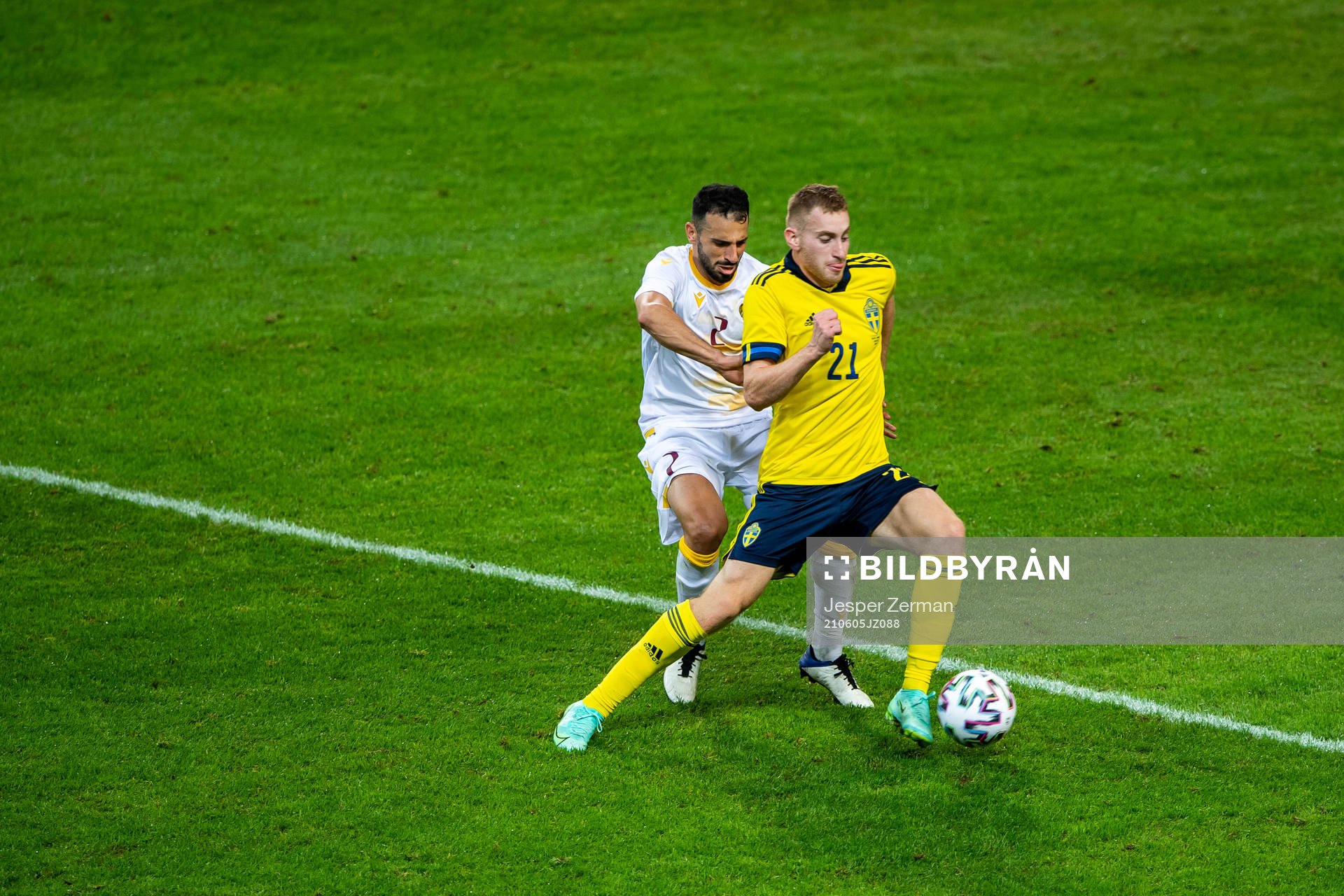 Andre Jack Calisir of Armenia and Dejan Kulusevski of Sweden