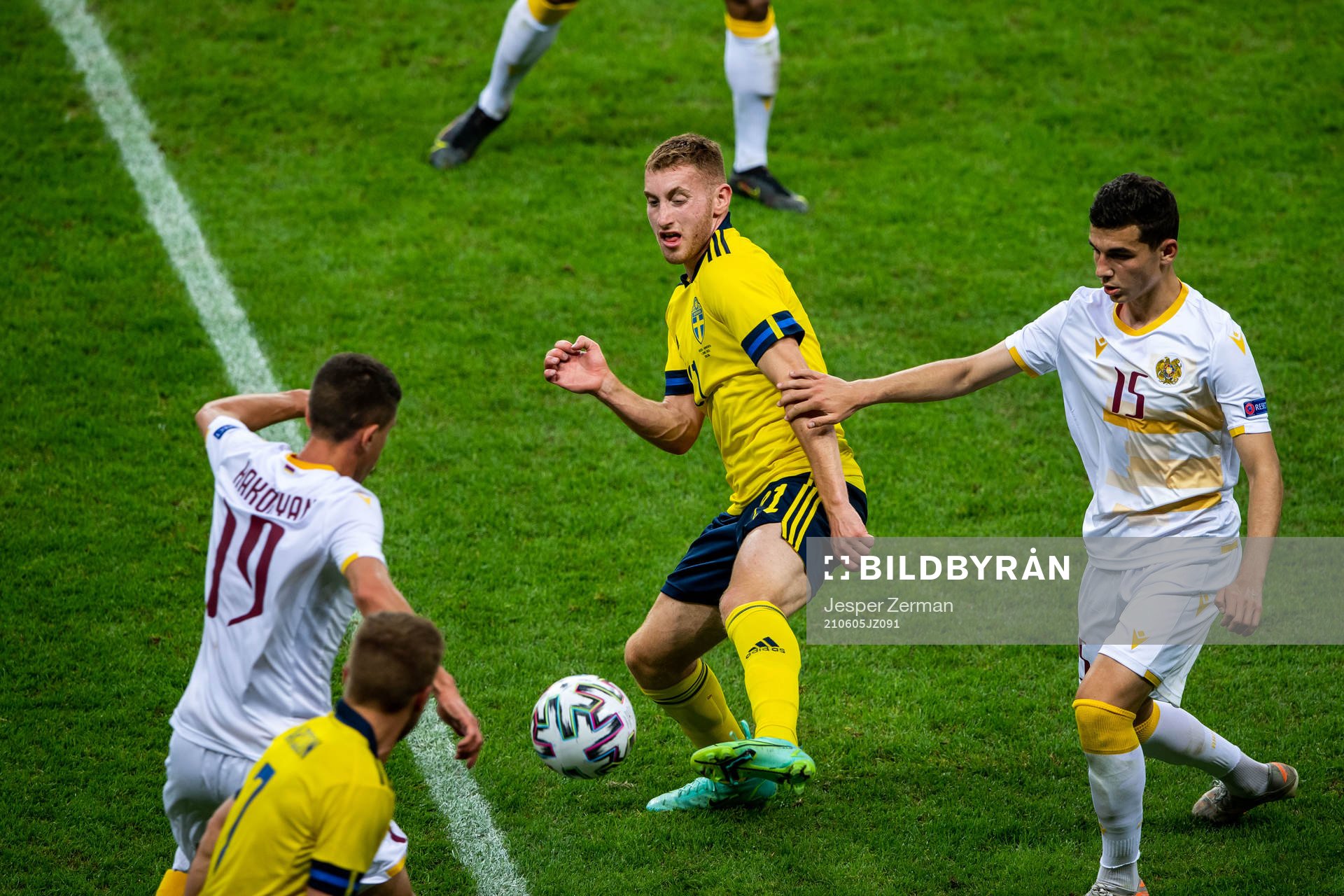 Dejan Kulusevski of Sweden and Eduard Spertsyan of Armenia