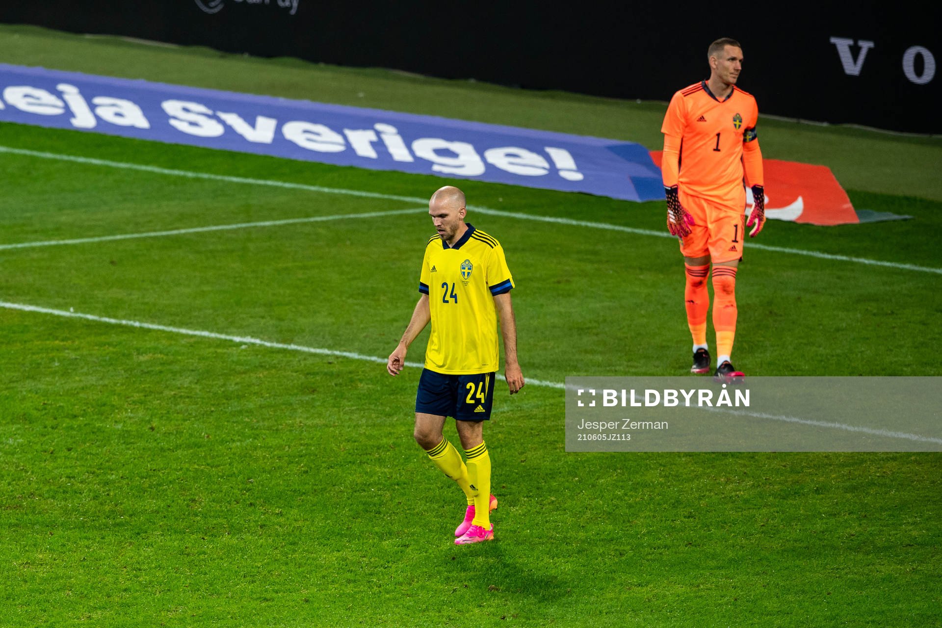 Marcus Danielson and goalkeeper Robin Olsen of Sweden looks