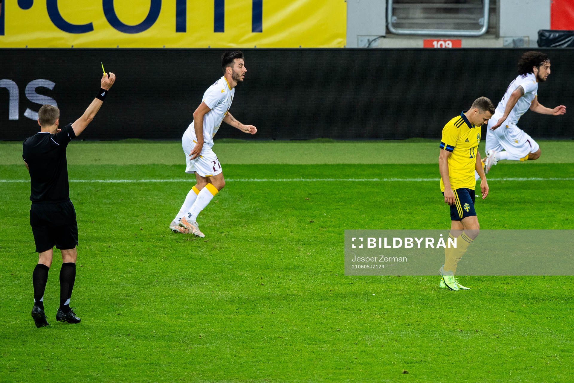 Referee Mattias Gestranius gives Viktor Claesson of Sweden