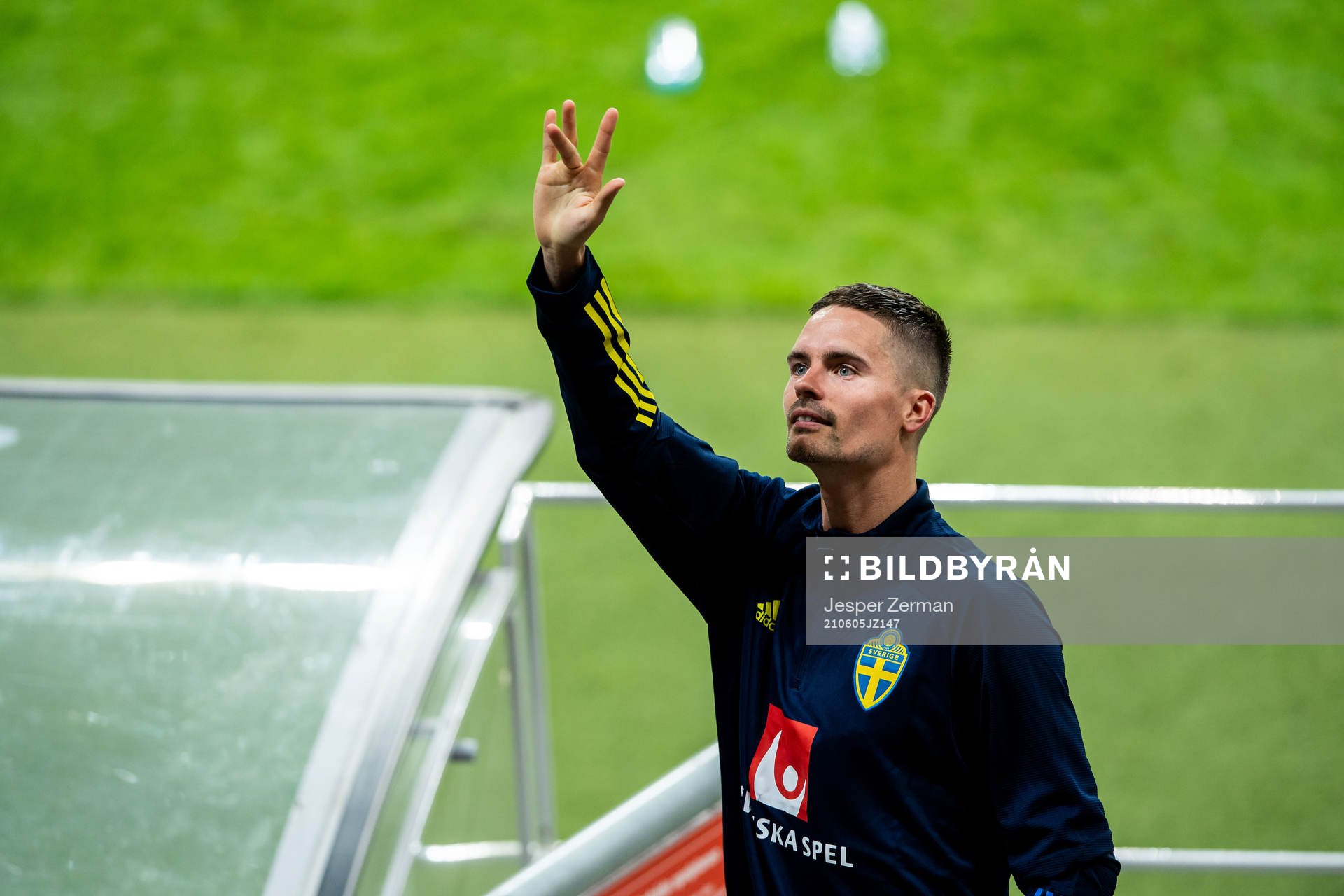 Mikael Lustig of Sweden waves