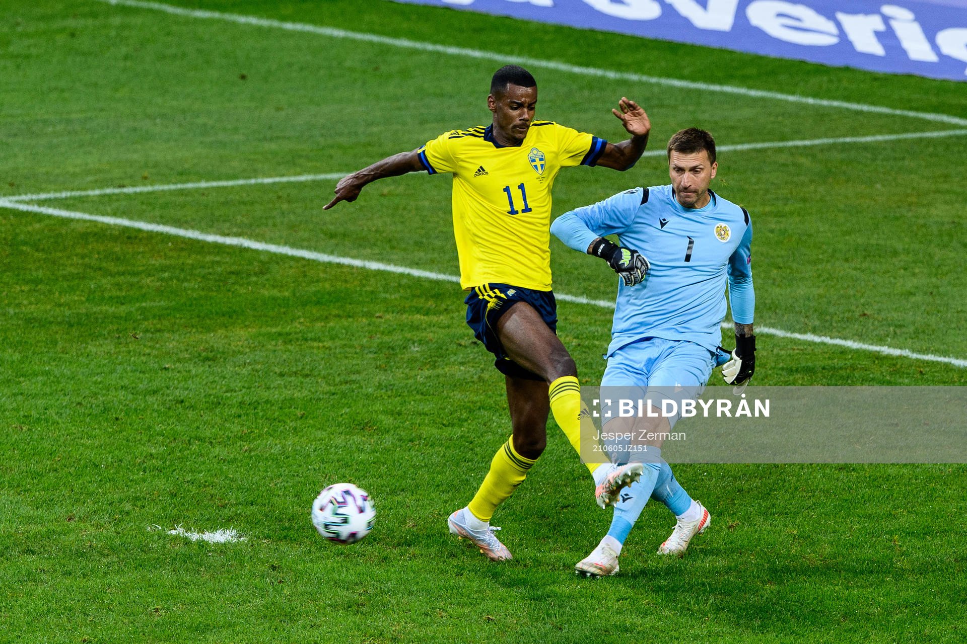 Alexander Isak of Sweden and goalkeeper Davit Yurchenko of