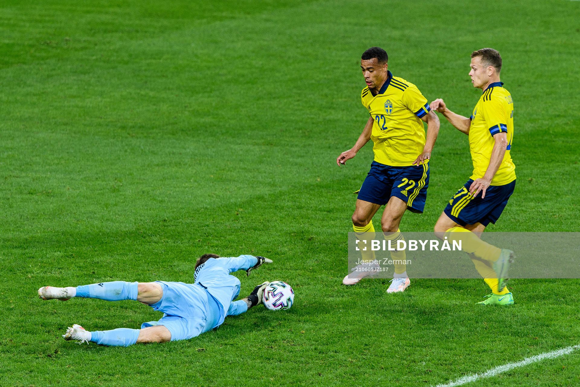 goalkeeper Davit Yurchenko of Armenia against Robin Quaison