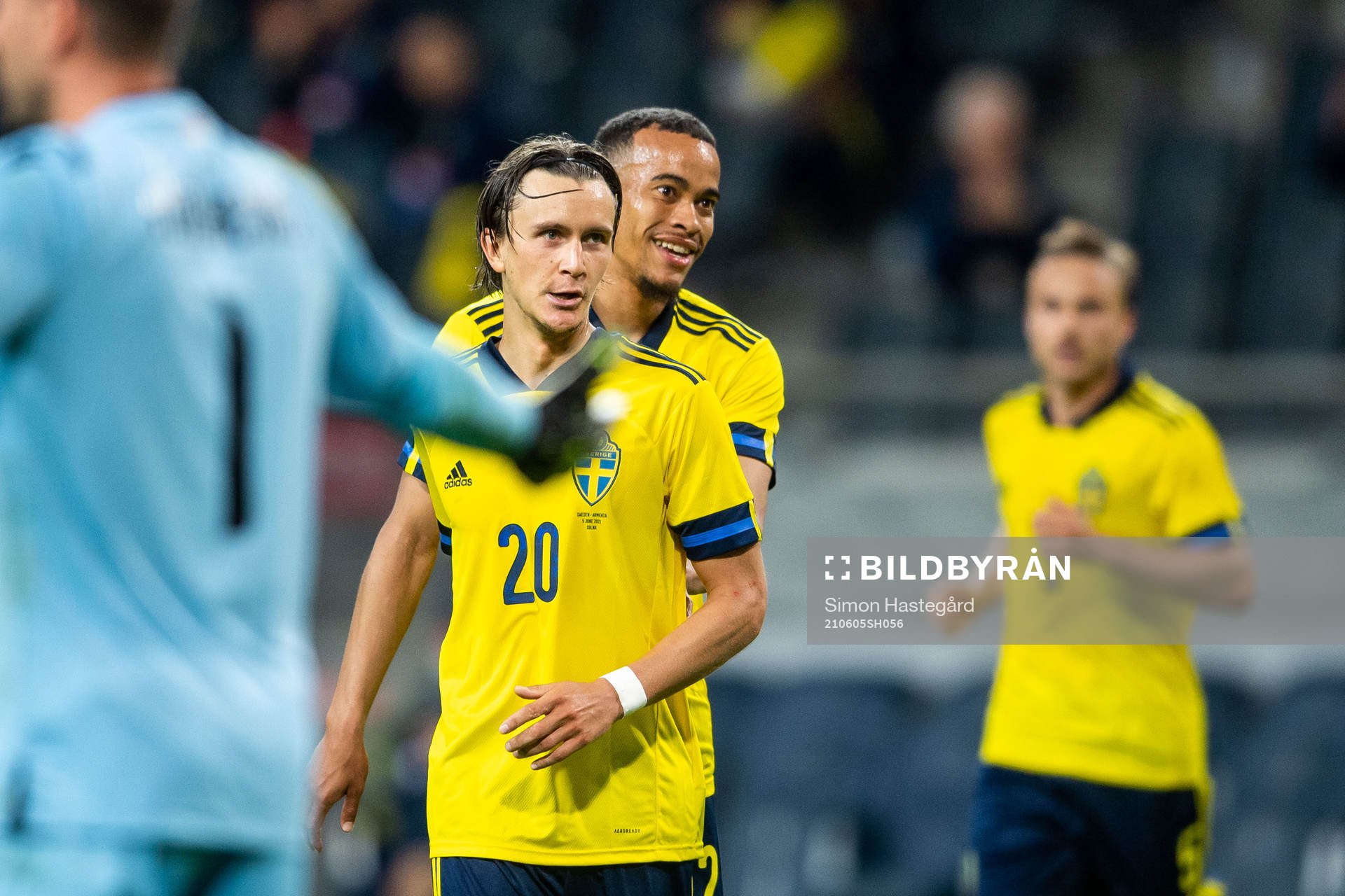 Kristoffer Olsson and Robin Quaison of Sweden celebrates