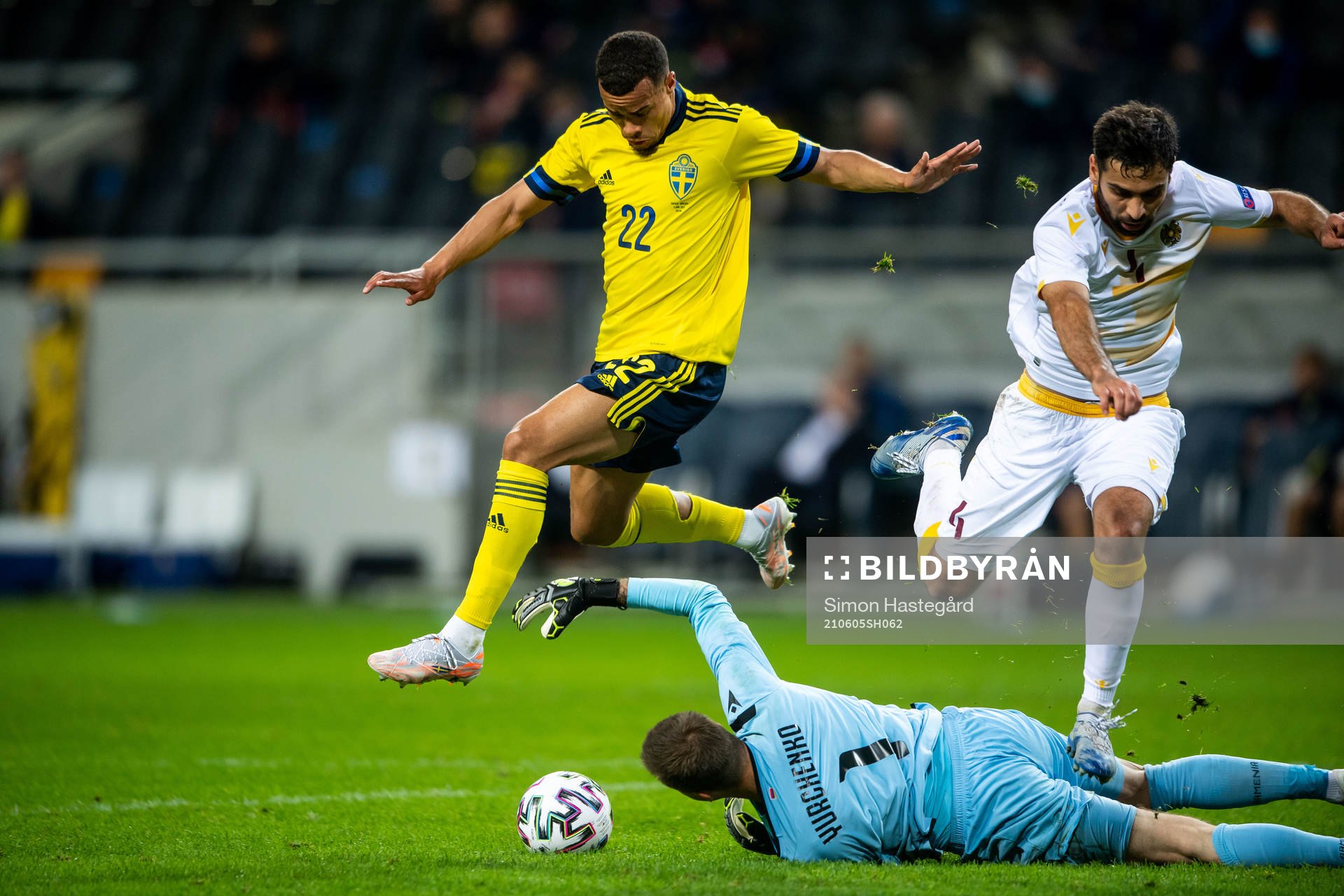 Robin Quaison of Sweden and goalkeeper Davit Yurchenko and Taron Voskanyan of Armenia during the international friendly football match between Sweden and Armenia on June 5, 2021 in Stockholm.