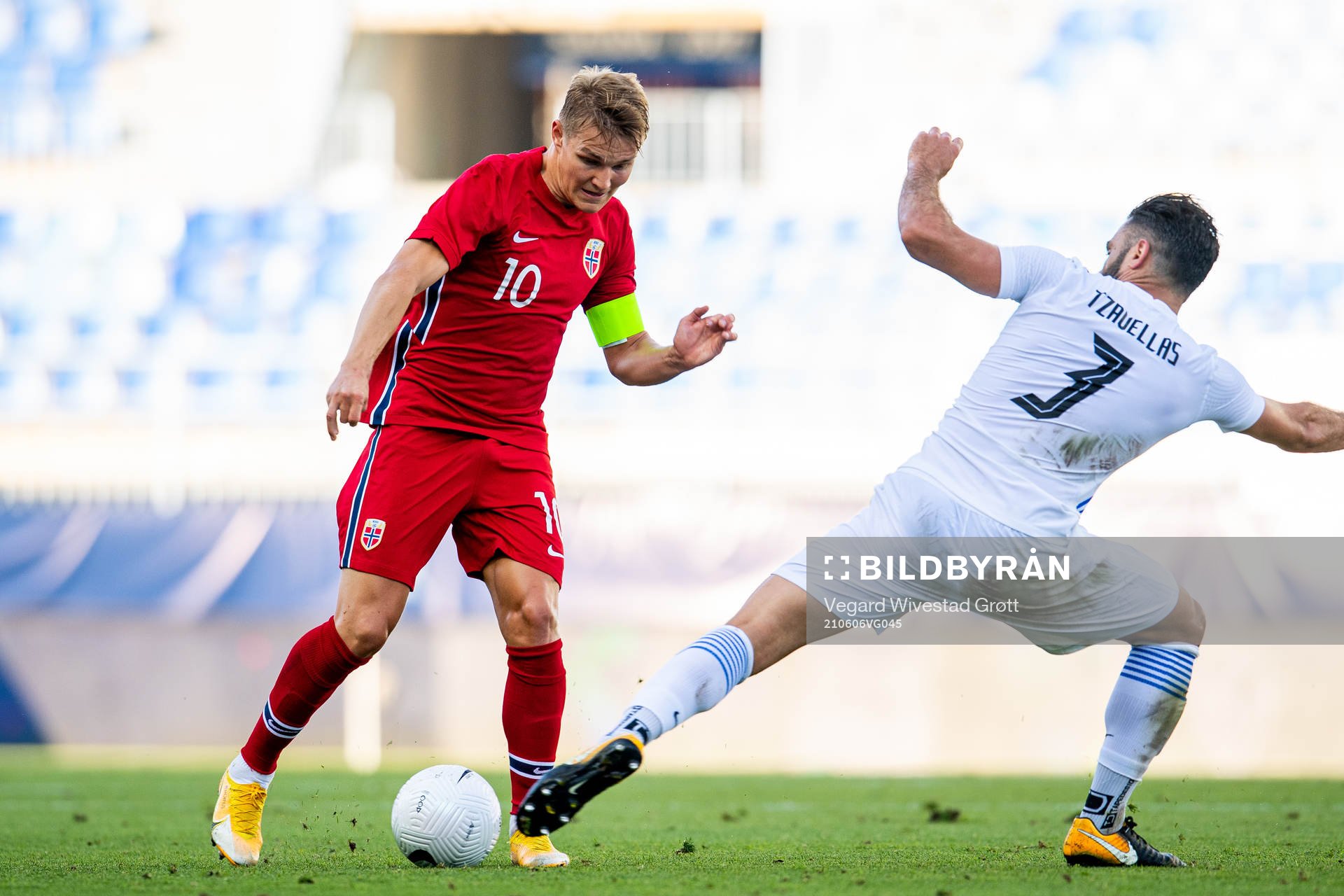Martin Ødegaard of Norway and Giorgos Tzavelas of Greece