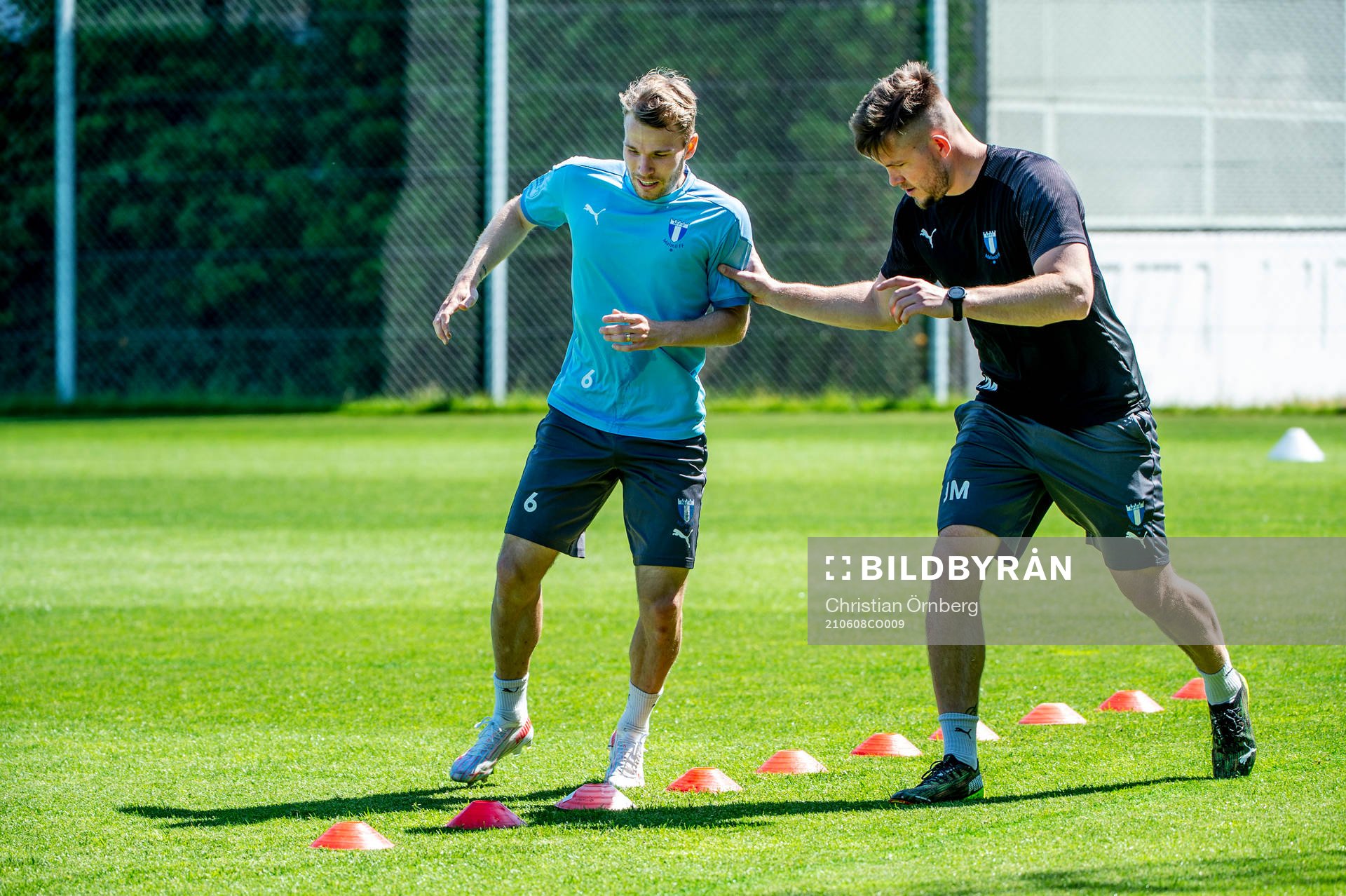 Oscar Lewicki och fystränare Jamie Mackay