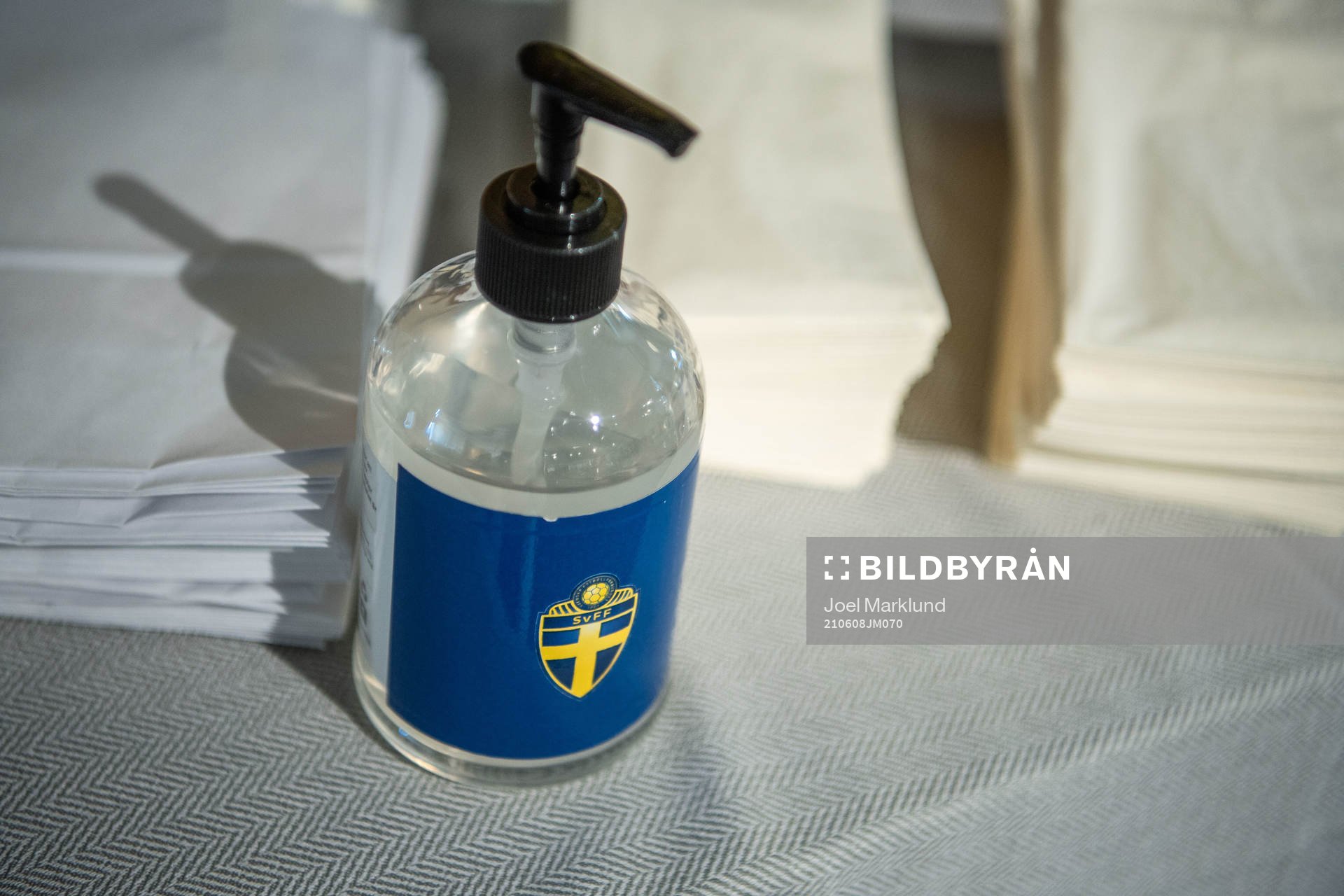 Hand disinfection against Covid-19 at a press conference