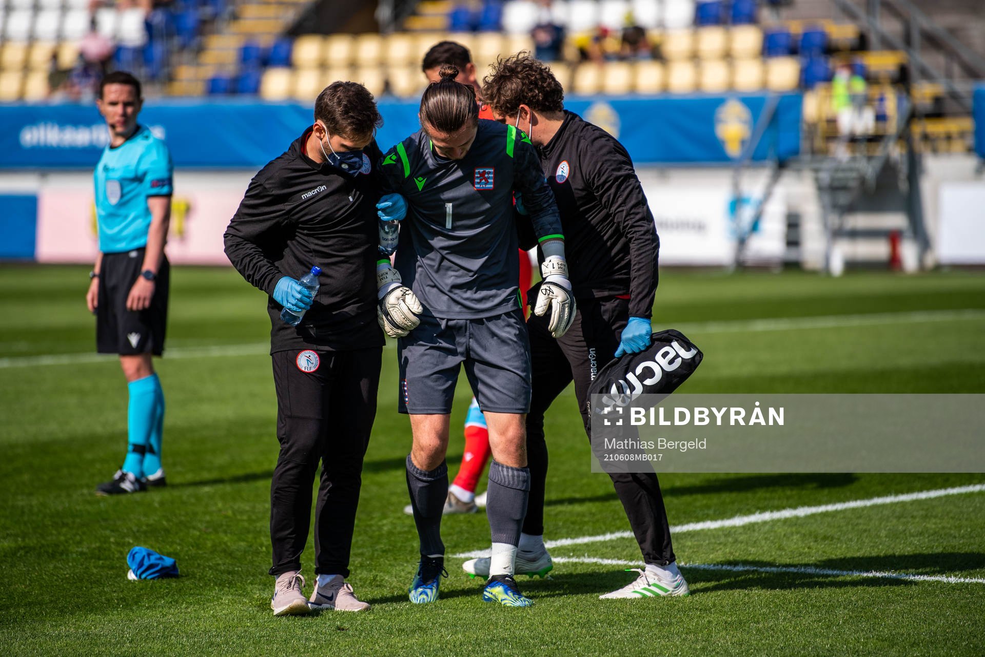 Goalkeeper Tim Kips of Luxembourg in pain