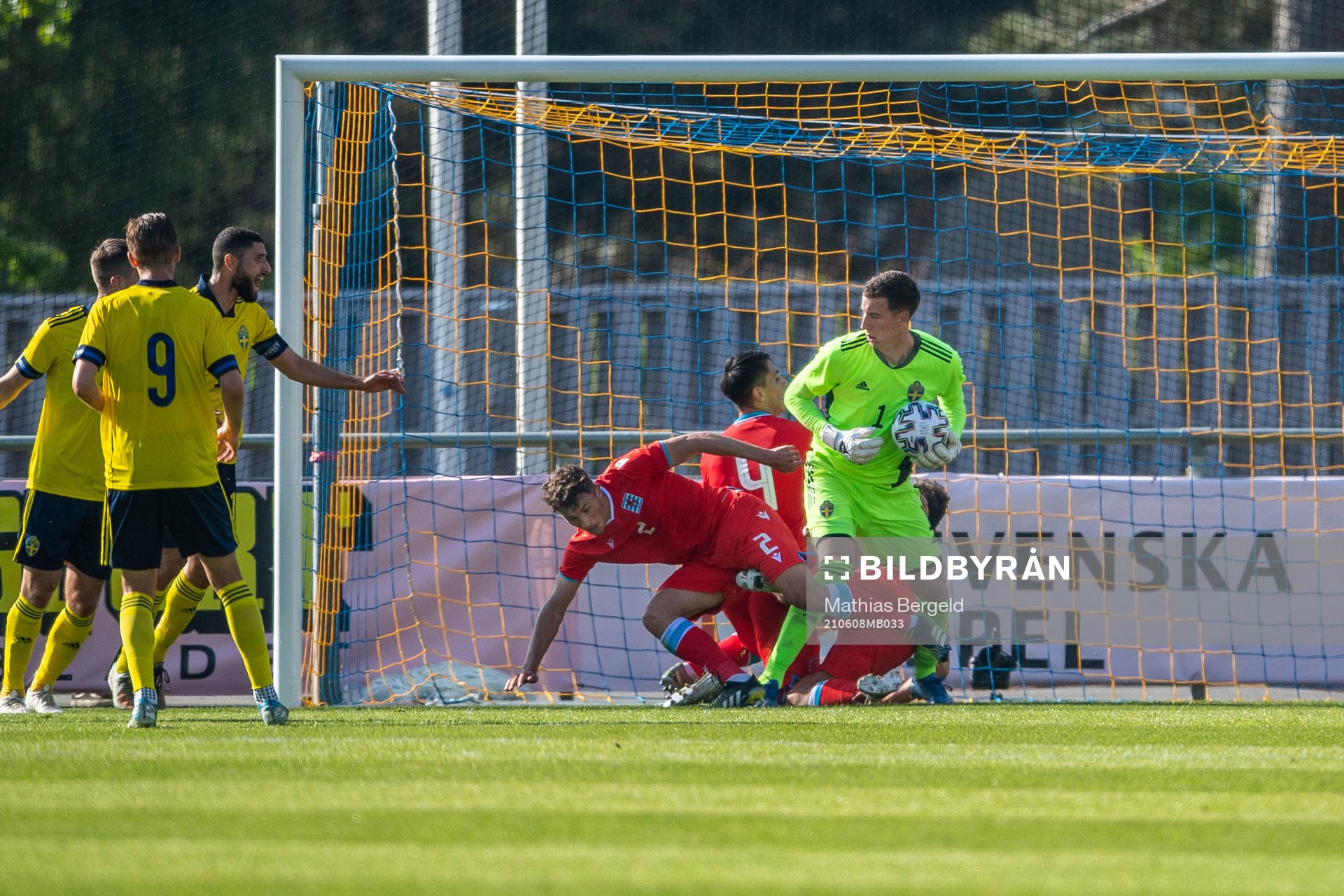 Goalkeeper Samuel Brolin of Sweden and Eldin Dzogovic and