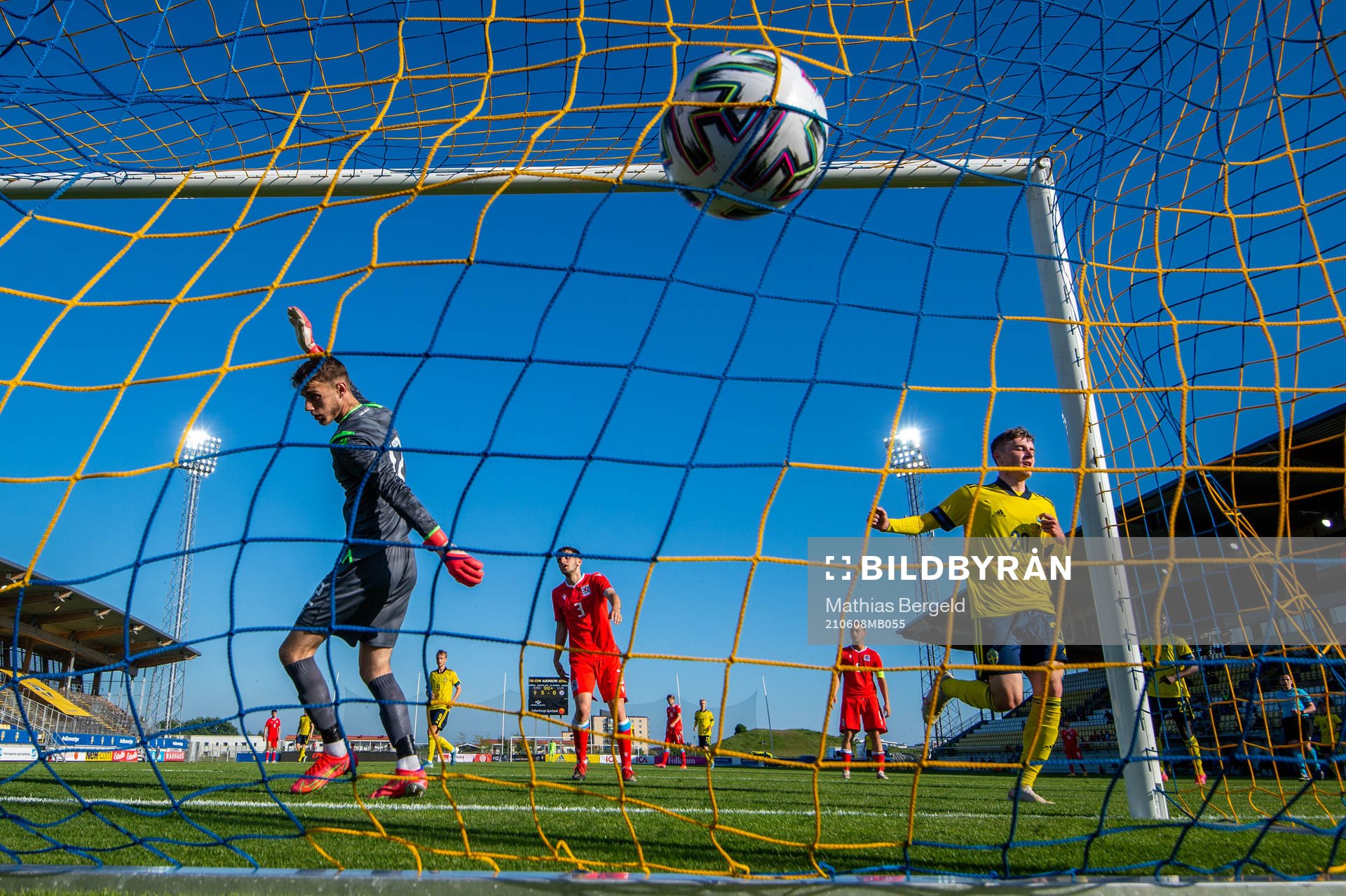 Patrik Wålemark of Sweden scores 6-0 behind goalkeeper