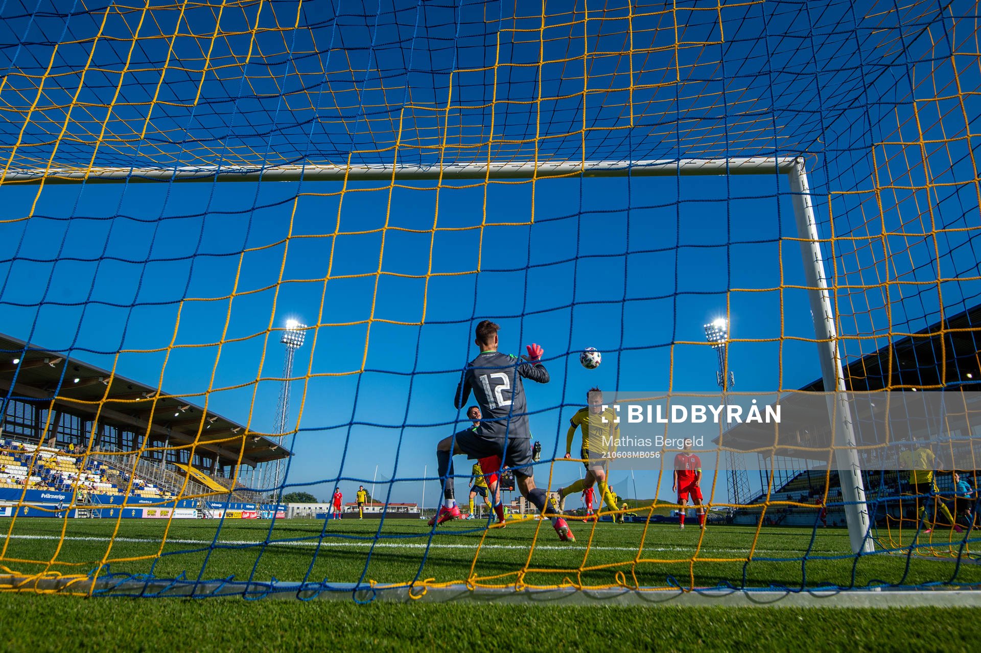 Patrik Wålemark of Sweden scores 6-0 behind goalkeeper
