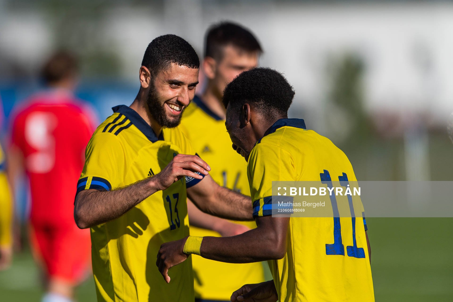 Aiham Ousou celebrates with Anthony Elanga of Sweden