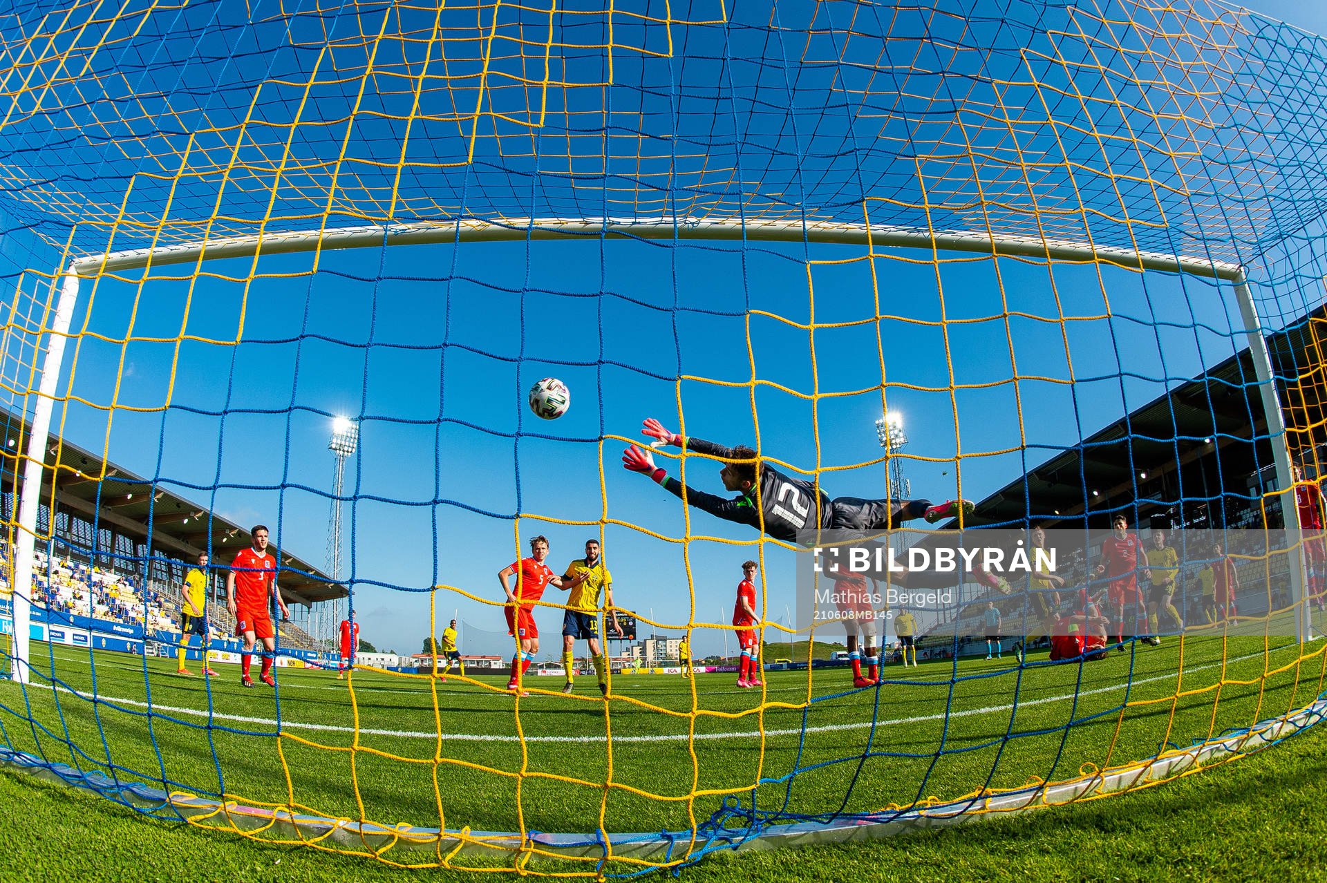 Patrik Wålemark of Sweden scores 5-0 behind goalkeeper