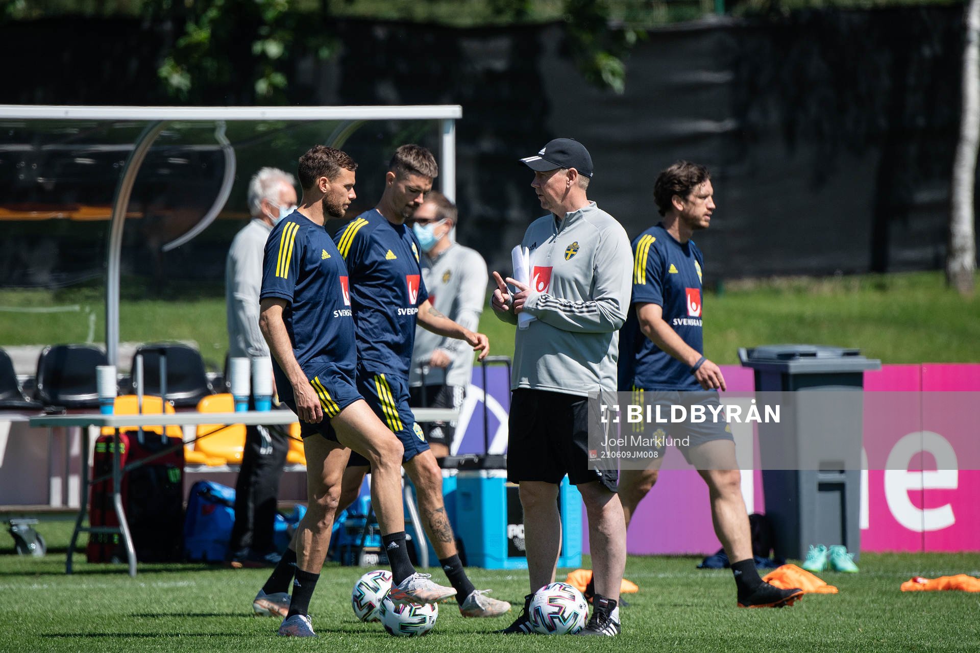 Marcus Berg, Mikael Lustig, assistant coach Peter