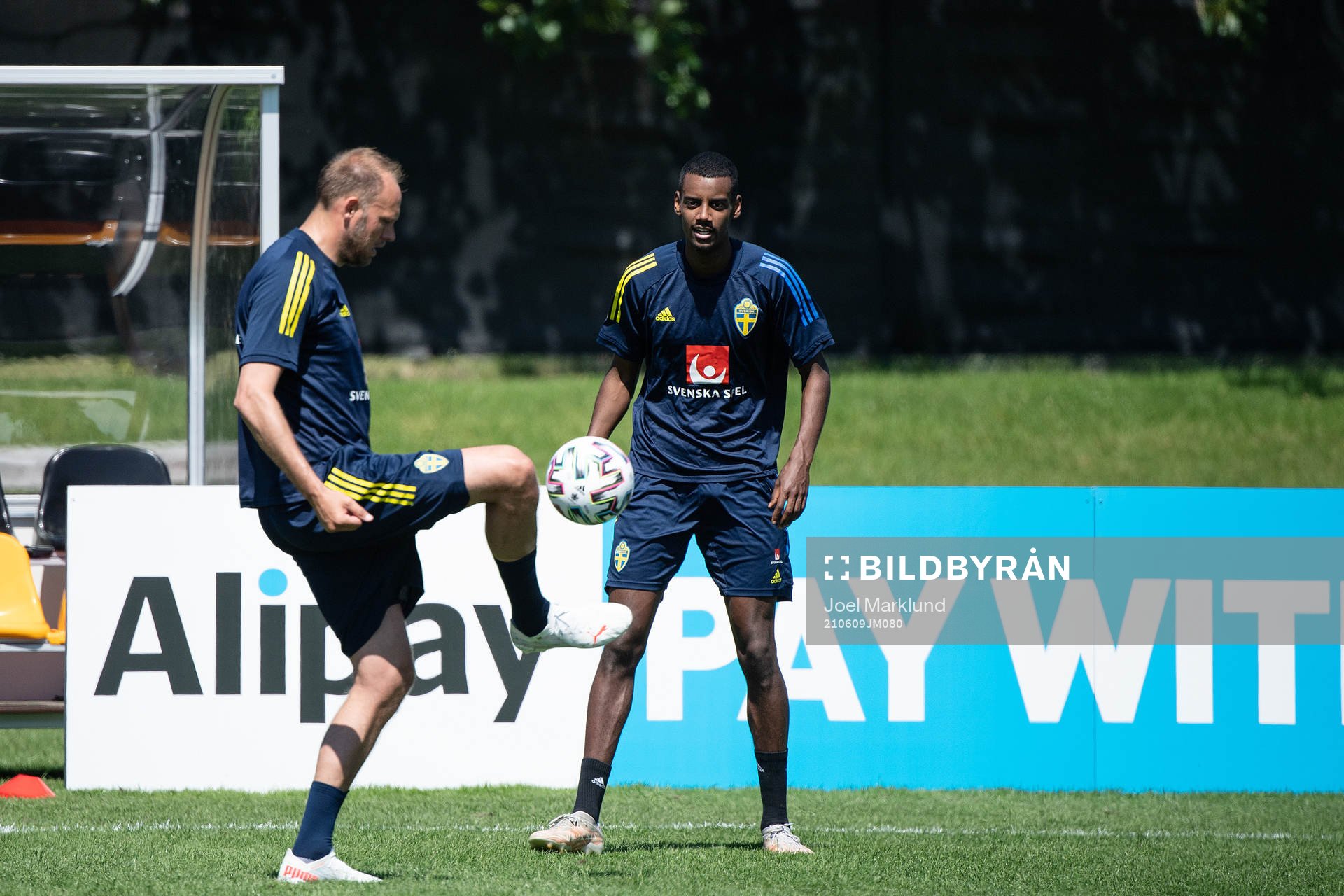 Andreas Granqvist  and Alexander Isak of the Swedish