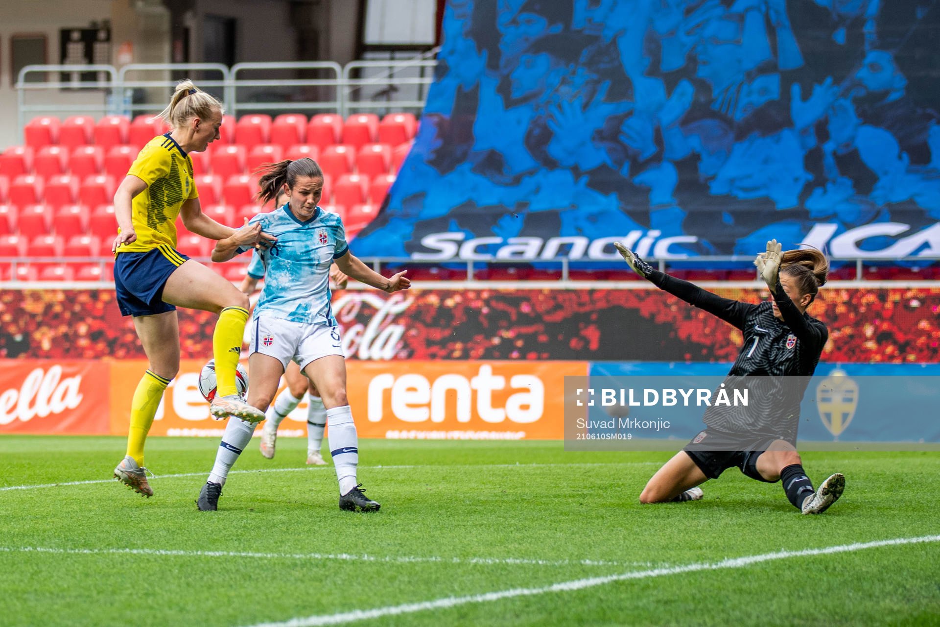Stina Blackstenius of Sweden and Tuva Hansen and goalkeeper