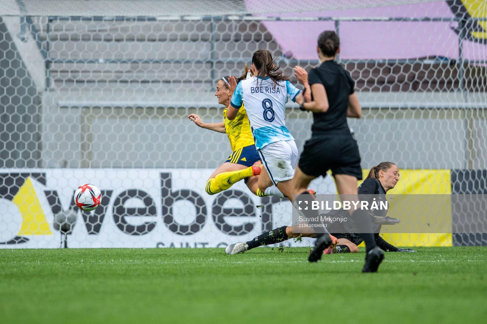 Kosovare Asllani of Sweden and goalkeeper Cecilie