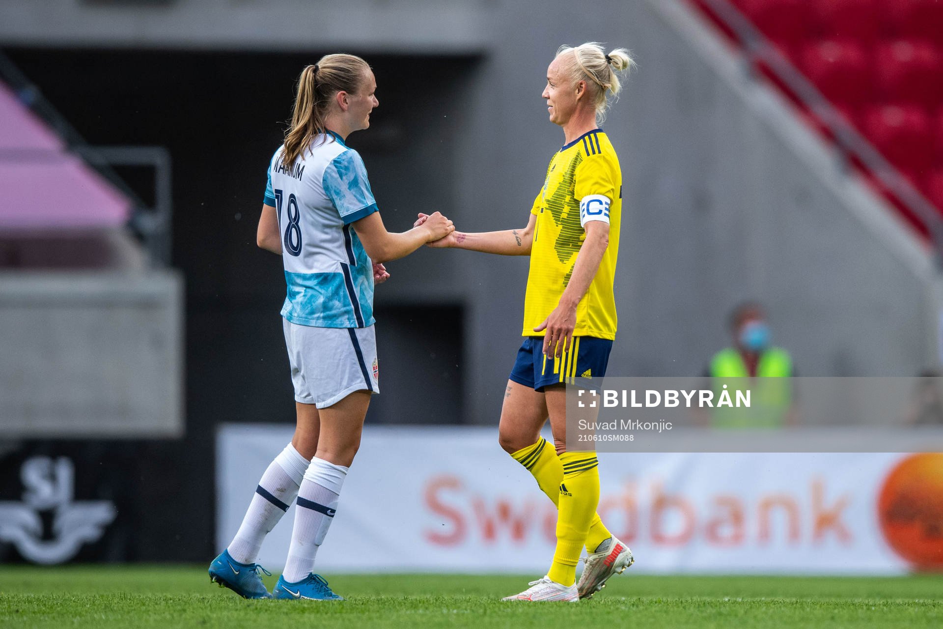 Frida Maanum of Norway and Caroline Seger of Sweden