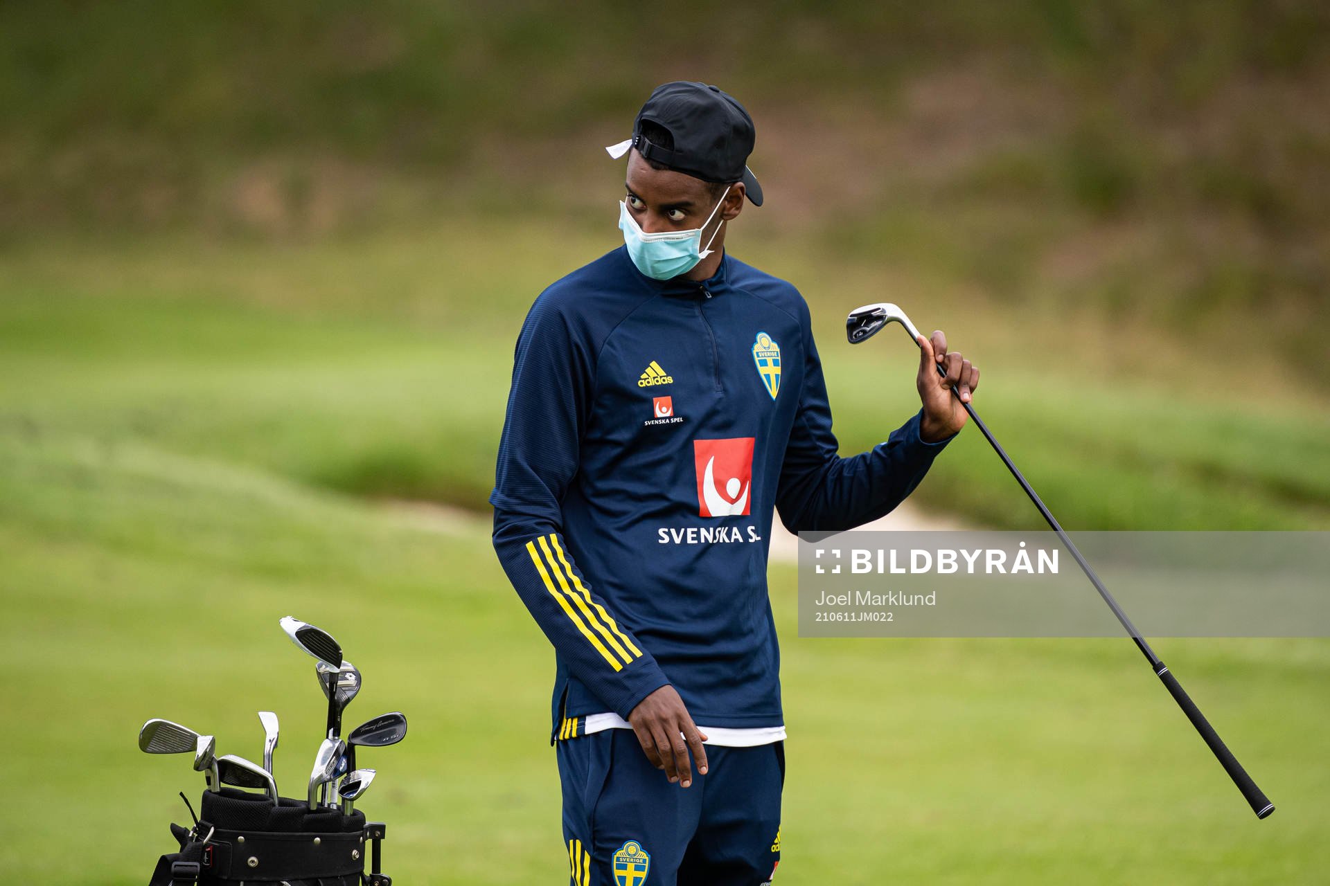 Alexander Isak of the Swedish national football team golfing