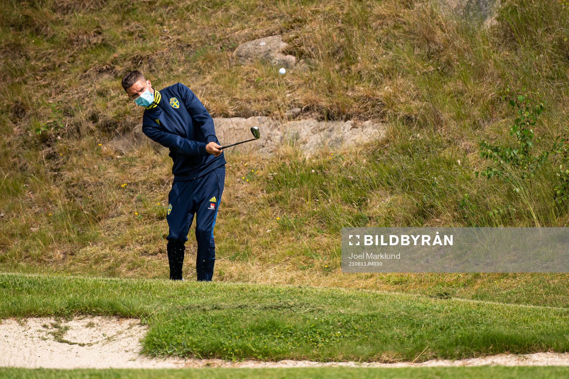 Mikael Lustig of the Swedish national football team golfing