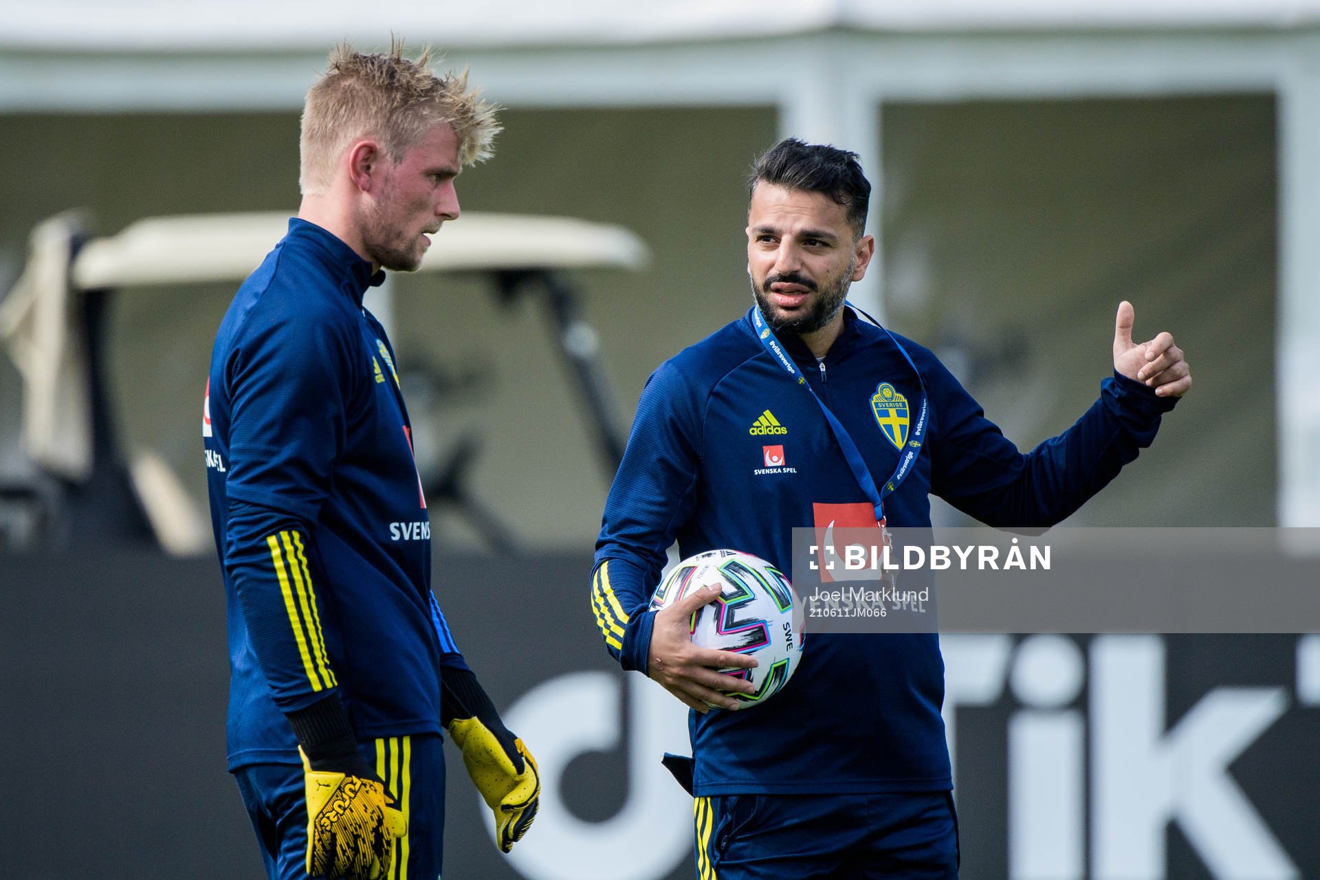 Goalkeeper Jacob Rinne and Poya Asbaghi, temporary coach of