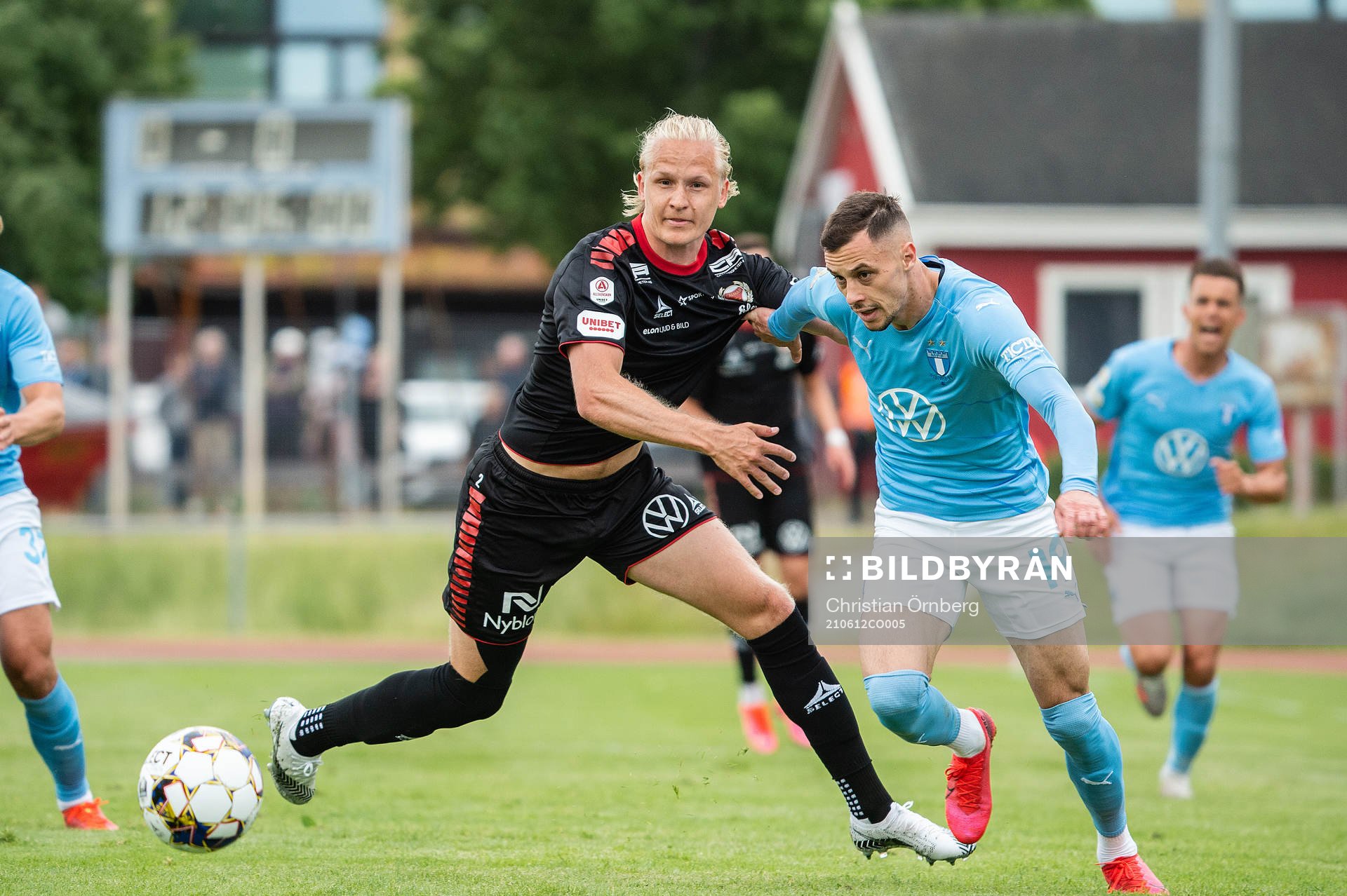 Kalmars Henrik Löfkvist och Malmö FFs Veljko Birmancevic