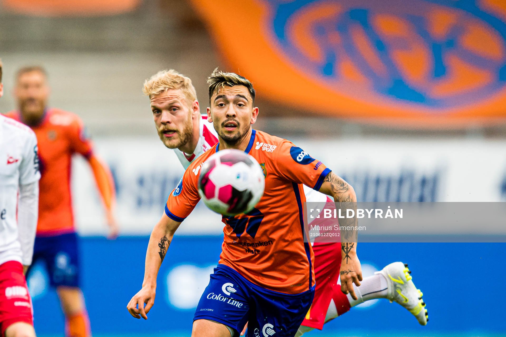 Mads Lennart Nielsen of Fredrikstad and Niklas Fernando Nygaard Castro of Aalesund during the OBOS-ligaen match between Aalesund and Fredrikstad on June 12, 2021 in Ålesund.