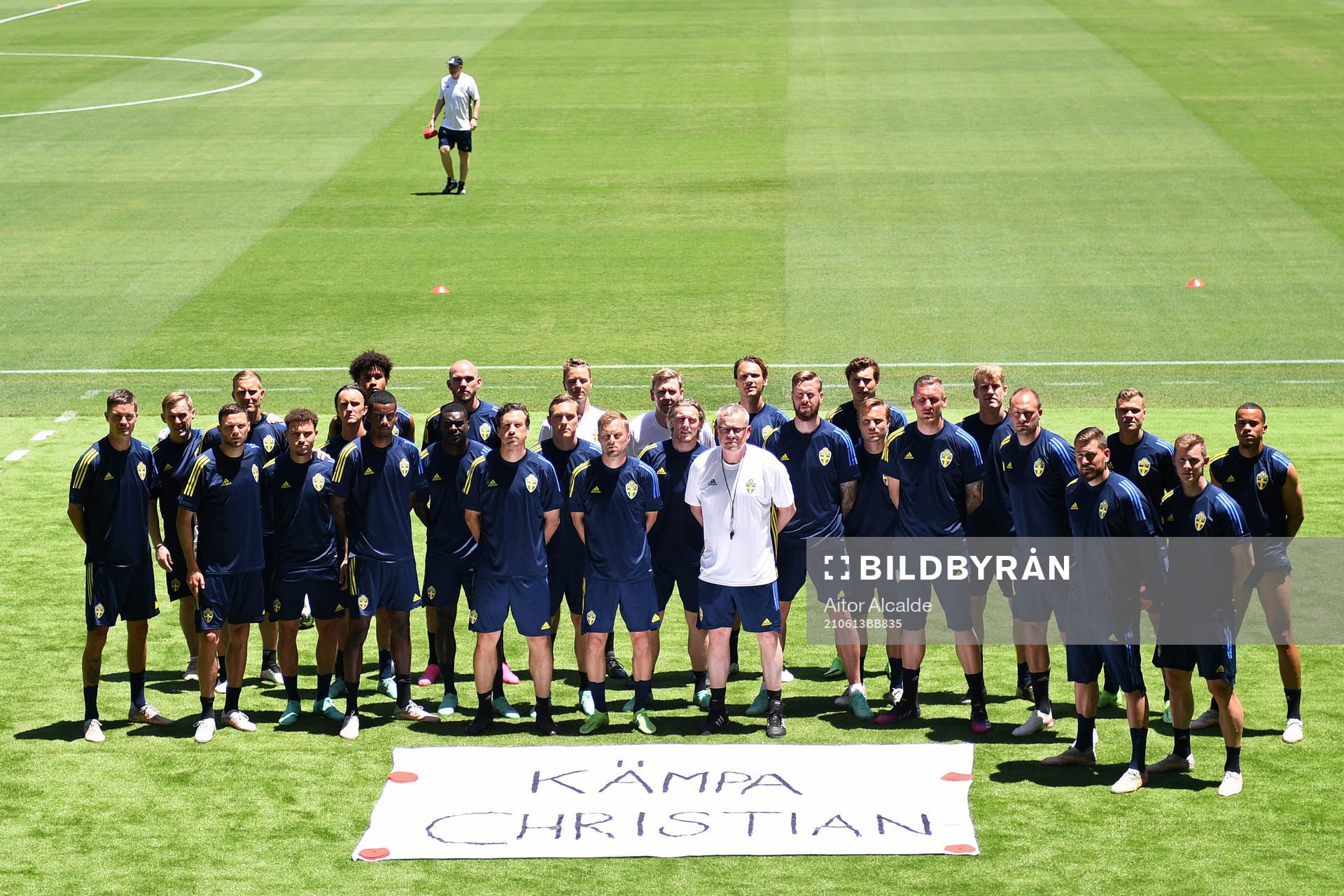 In this handout photo from UEFA players and coaching staff