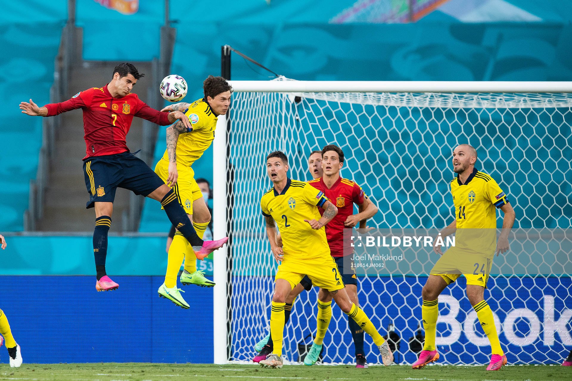 Alvaro Morata of Spain and Victor Nilsson Lindelöf of