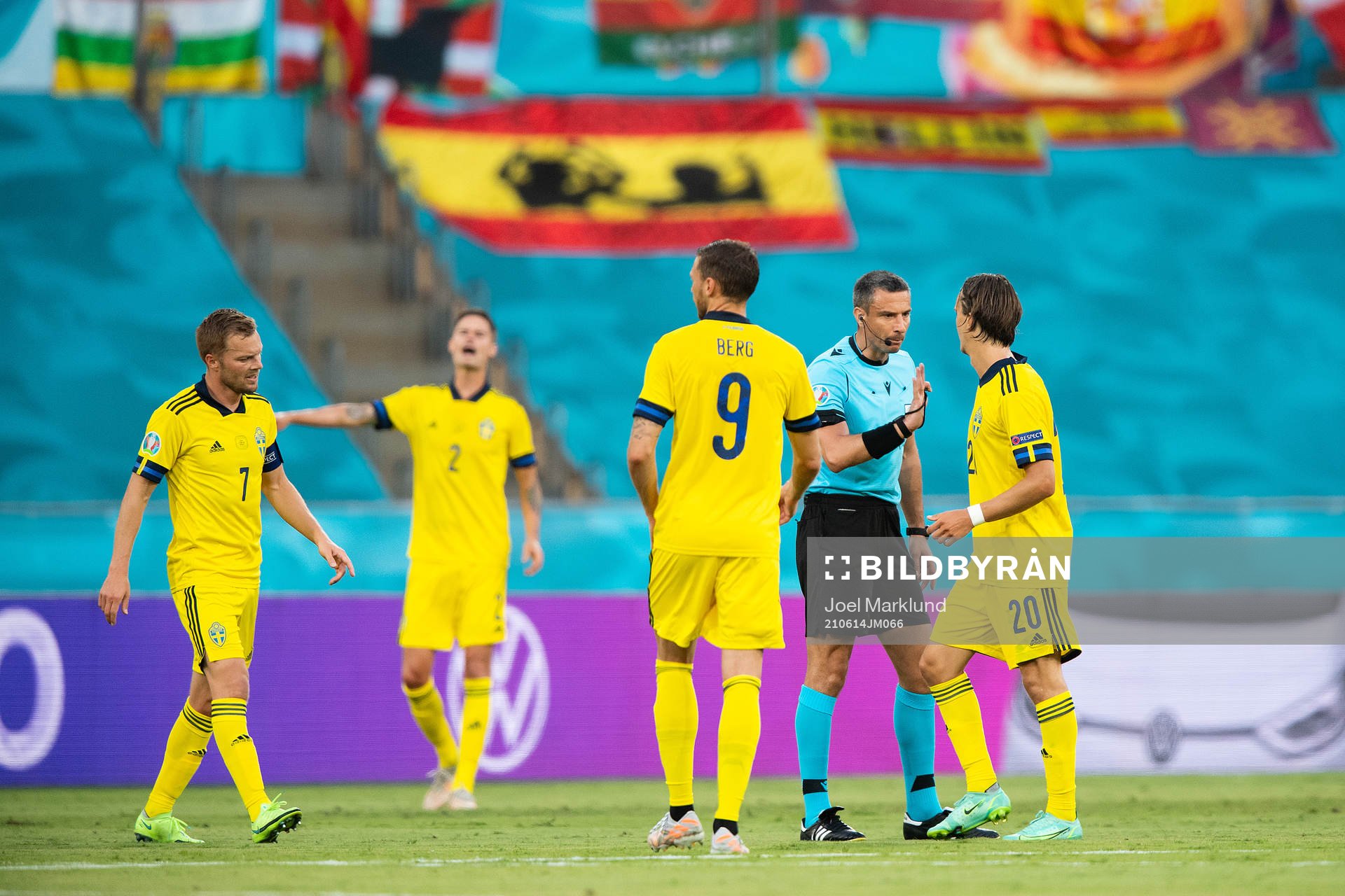 referee Slavko Vincic and Kristoffer Olsson of Sweden