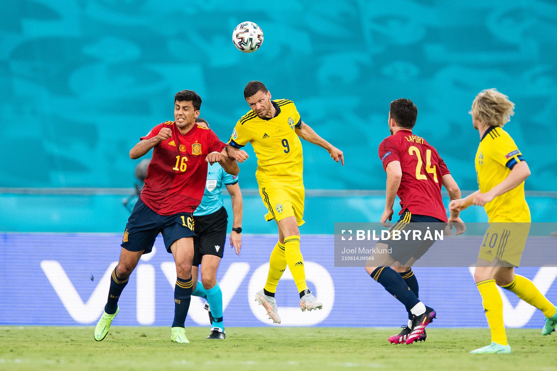 Rodri Rodri of Spain and Marcus Berg of Sweden