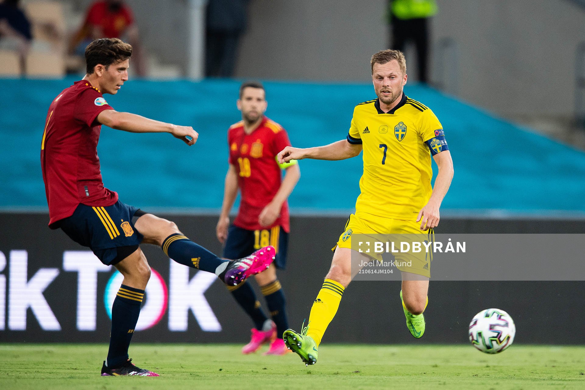 Pau Torres of Spain and Sebastian Larsson of Sweden