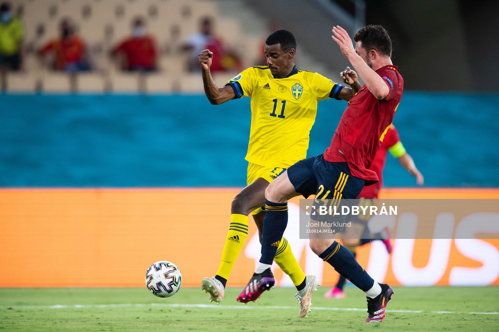 Alexander Isak of Sweden and Aymeric Laporte of Spain