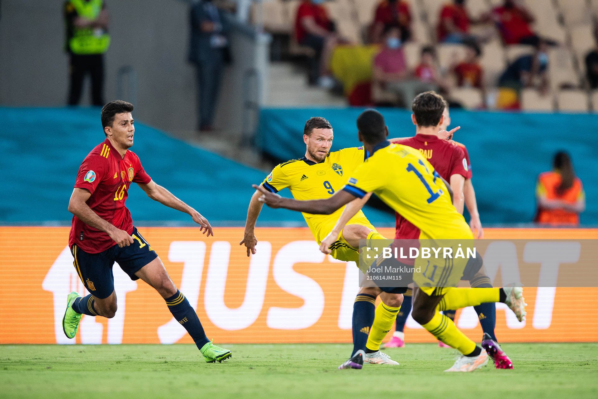 Rodri Rodri of Spain and Marcus Berg of Sweden