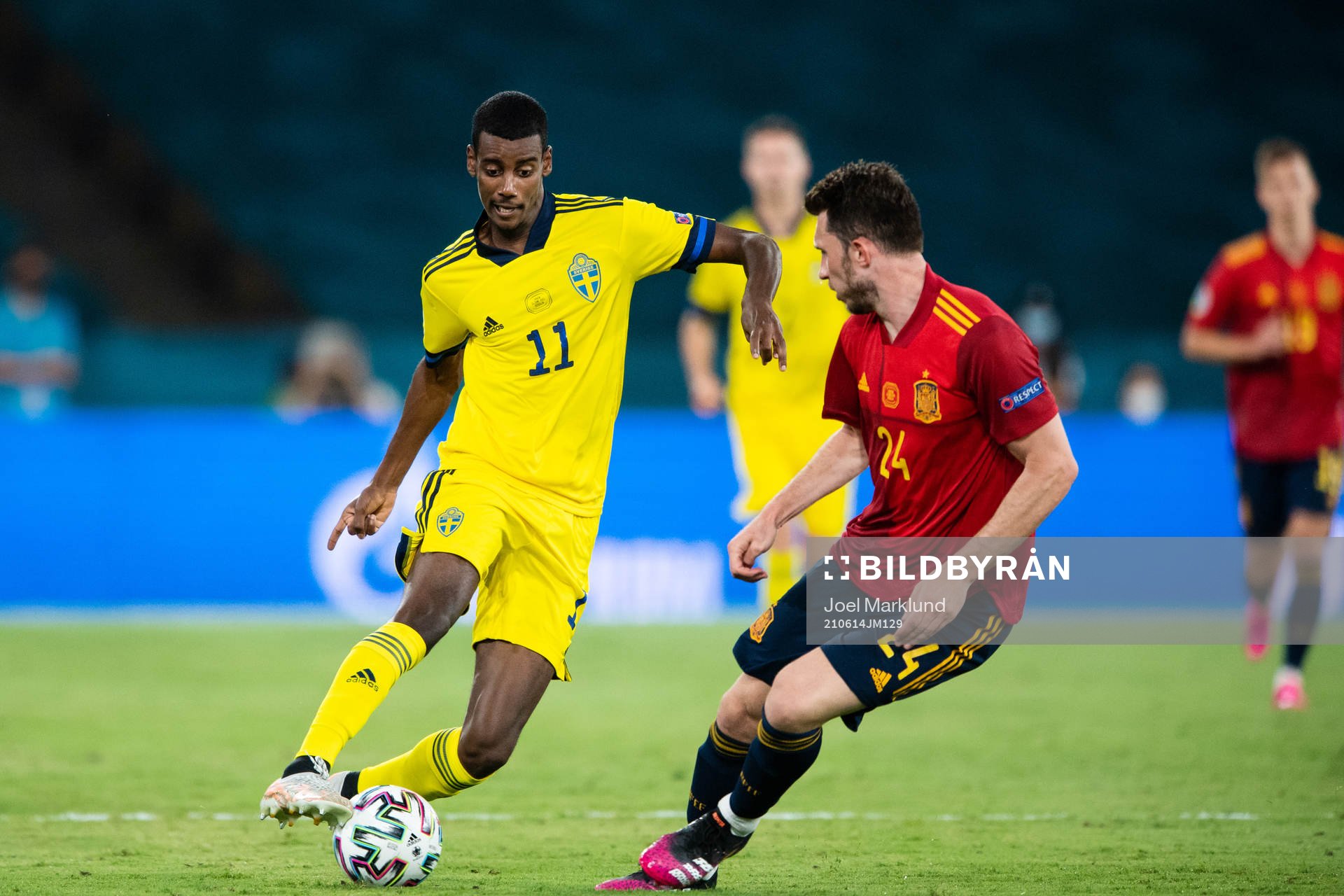 Alexander Isak of Sweden and Aymeric Laporte of Spain